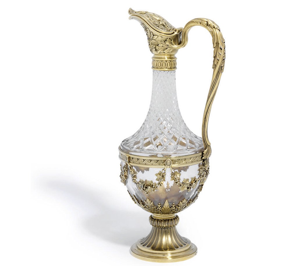 A FRENCH SILVER-GILT MOUNTED CUT-GLASS CLARET-JUG