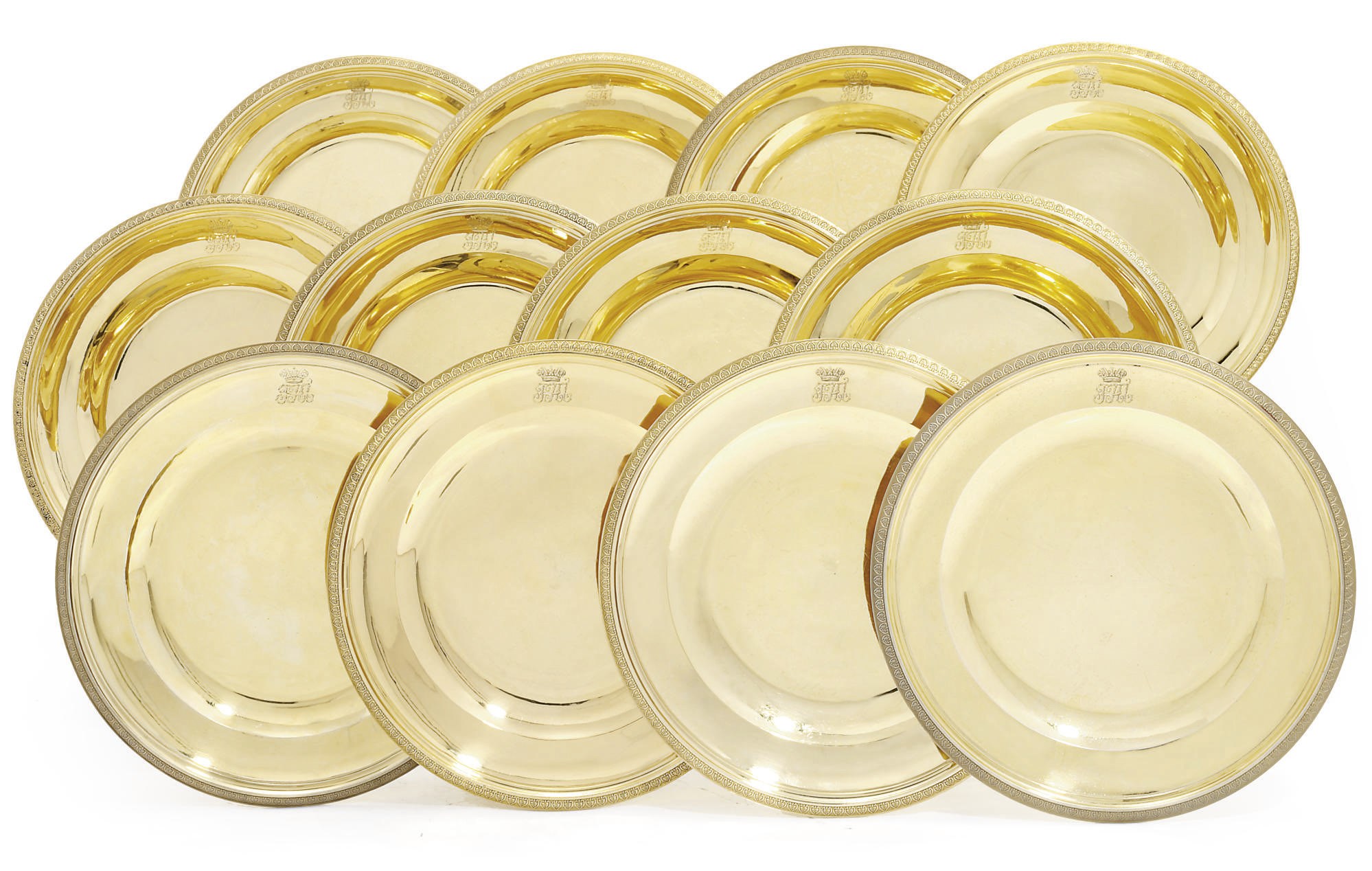 A SET OF TWELVE FRENCH EMPIRE SILVER-GILT DESSERT-PLATES FROM THE GRAND DUKE NICHOLAS PAVLOVICH SERVICE
