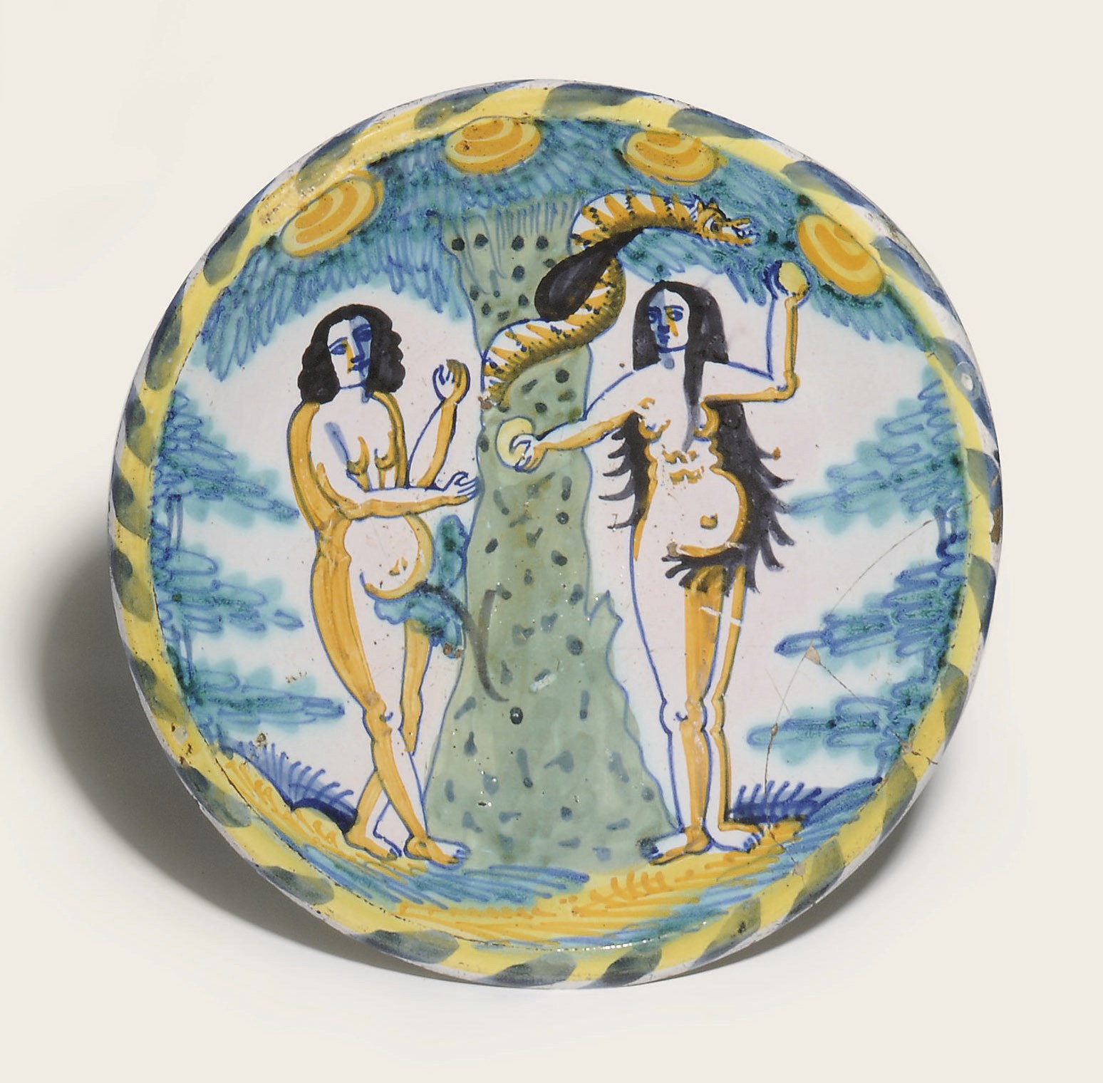 AN ENGLISH DELFT BLUE-DASH ADAM AND EVE CHARGER