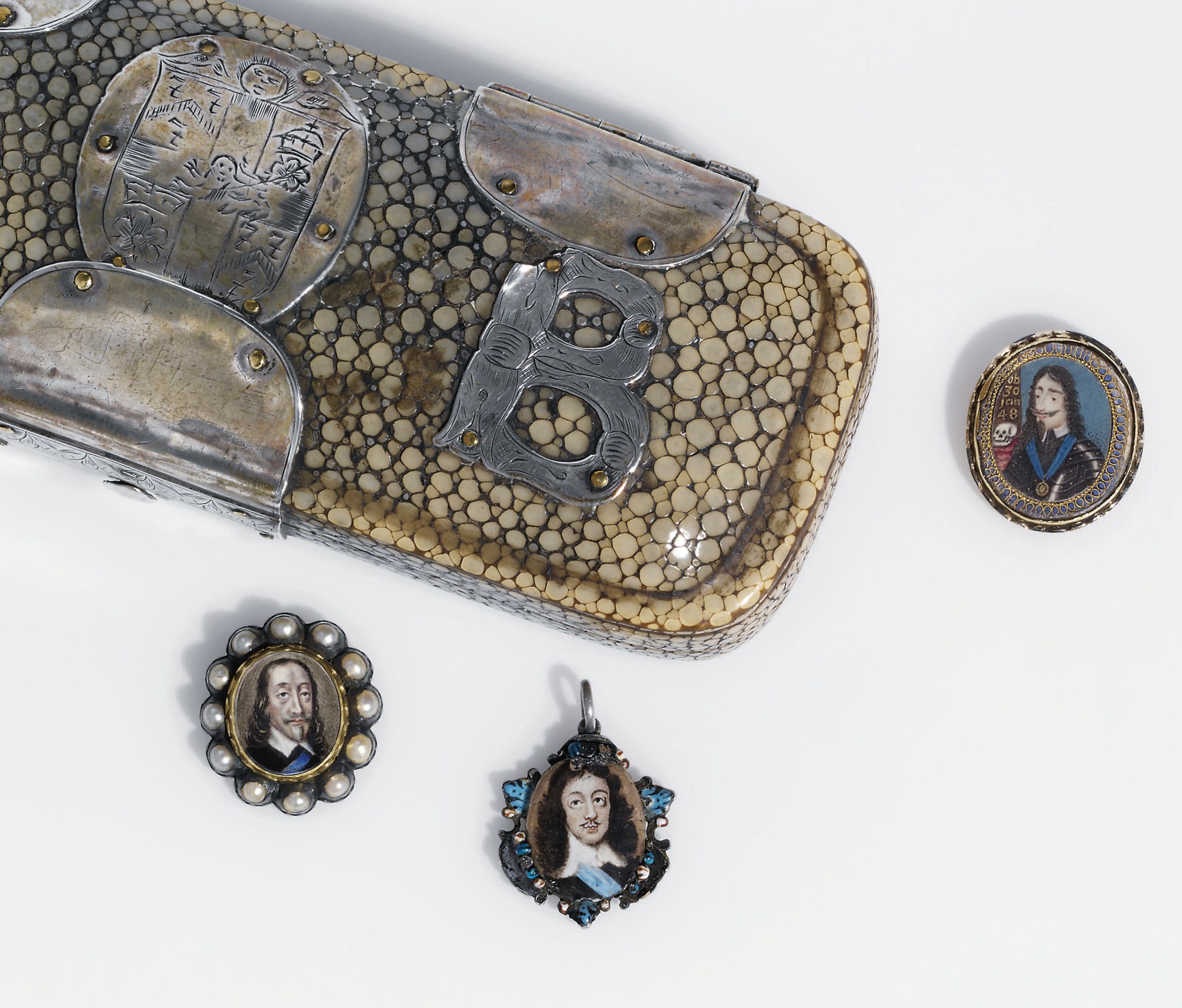A WILLIAM AND MARY SILVER-MOUNTED SHAGREEN CASE CONTAINING THREE CHARLES I MEMORIAL PENDANTS