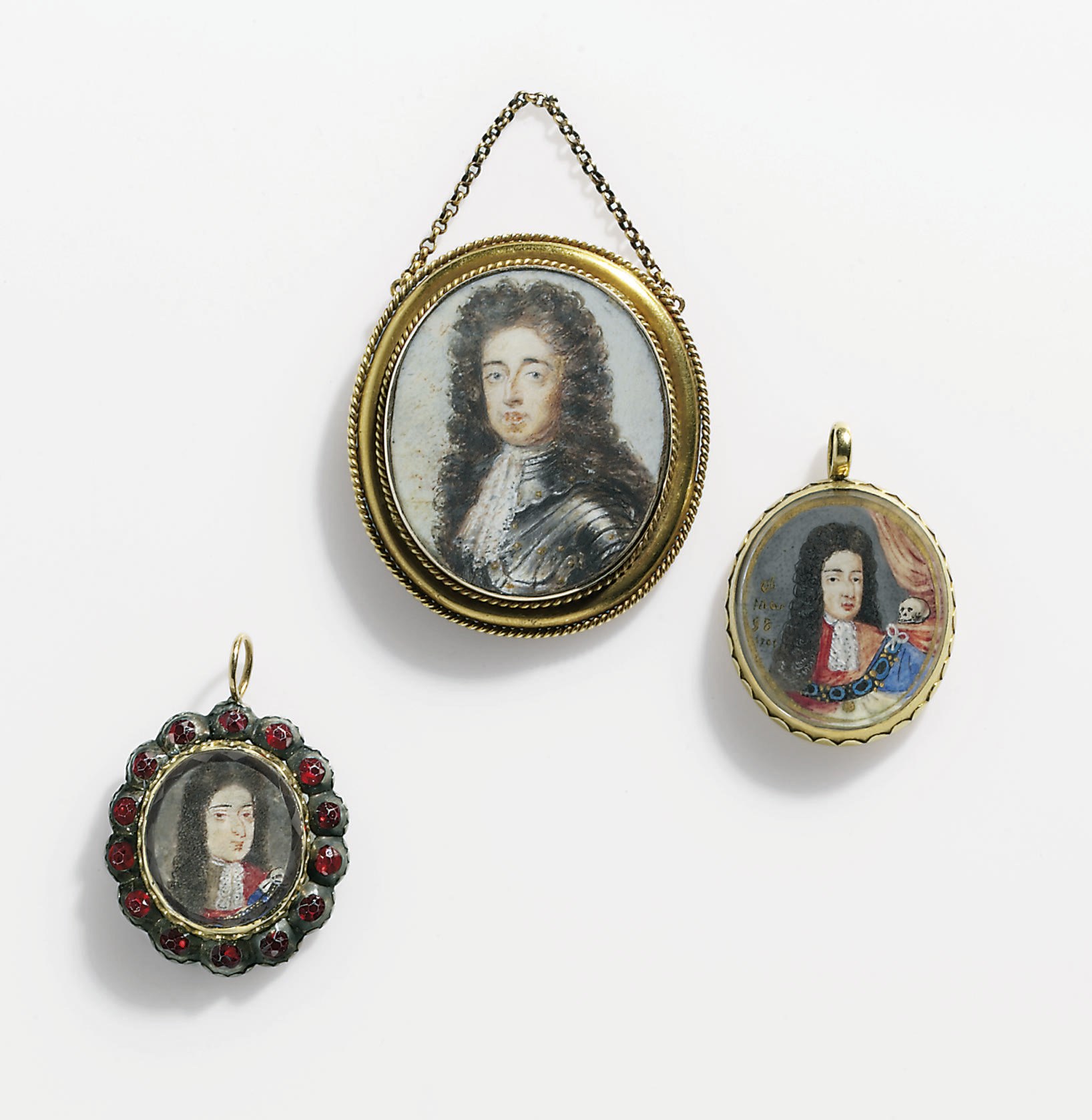 TWO WILLIAM III MEMORIAL PENDANTS AND A WILLIAM III COMMEMORATIVE PENDANT