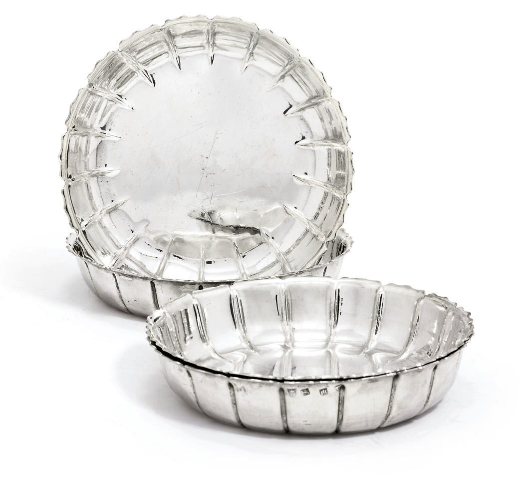 A SET OF FOUR GEORGE I SILVER STRAWBERRY-DISHES