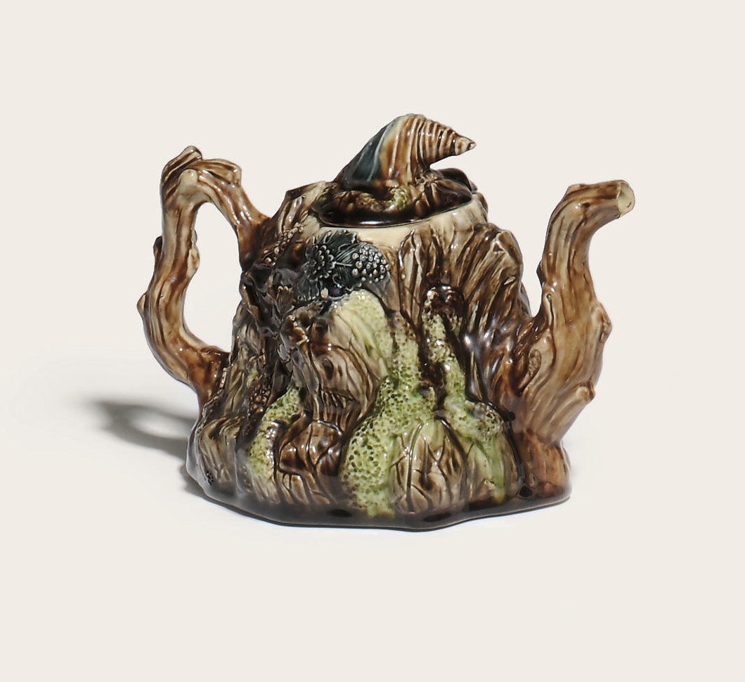 A STAFFORDSHIRE CREAMWARE WHIELDON-TYPE TEAPOT AND COVER