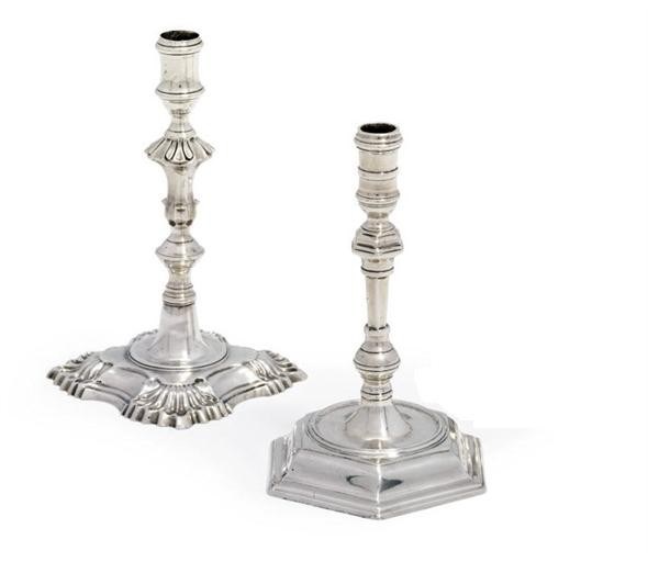 TWO GEORGE I SILVER TAPERSTICKS AND A GEORGE III SILVER TAPERSTICK