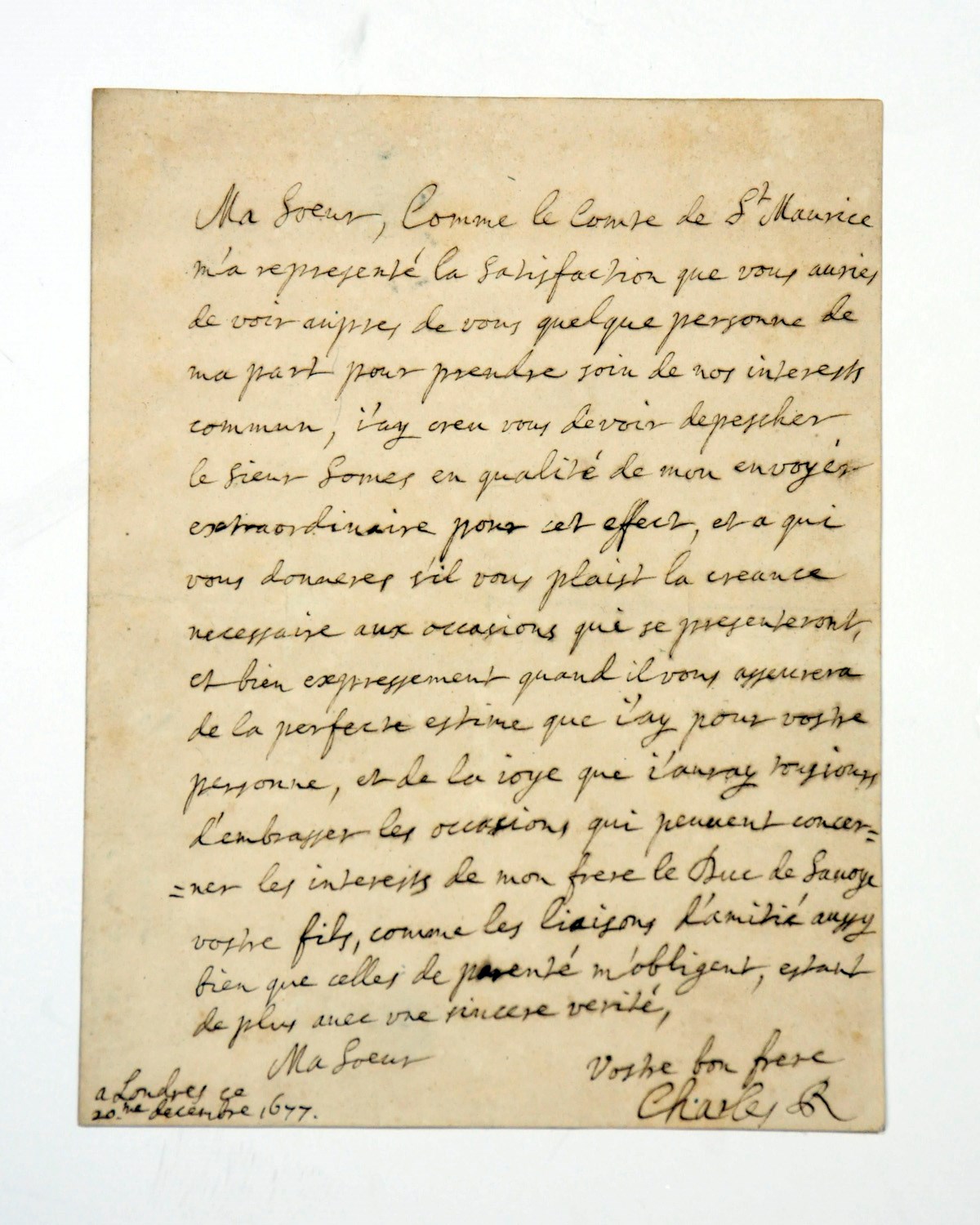 CHARLES II (1630-1685), King of England, Scotland and Ireland. Autograph letter signed ('Vostre bon frere  Charles R') to the Duchess Regent of Savoy [Marie-Jeanne of Savoy-Nemours], London, 20 December 1677, in French, sending, in response to her request, 'Sieur Somes' as his envoy 'pour prendre soin de nos interests commun', and asking her to give him her trust, especially when conveying Charles's esteem and his pleasure in serving the Duke of Savoy's interests, one page, small 4to, autograph address leaf, small red wax seals on remains of silk cords, contemporary docket; in a red cloth slipcase.