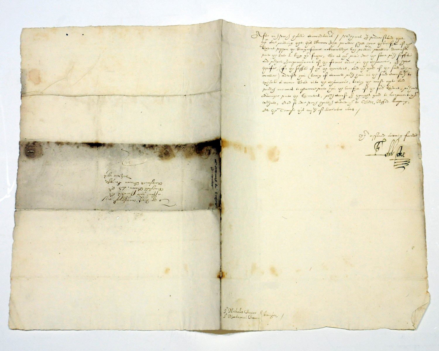 COKE, Sir Edward (1552-1634). Letter signed ('Edw. Coke') to Sir Nathaniel and Sir Nicholas Bacon, 'At the Temple', 4 December 1604, informing them of the right of John Waller to 'the benefytt of your Extent upon the Recognisaunce acknowledge [sic] by William Waller deceased unto the late L[ord] Keep[er] your father'; he has advised Waller to 'exhibit a newe Bill into the chauncerie' as the best means of procuring this, half page, folio, address leaf, small impressed seal. Provenance: Sotheby's sale, 22 June 1976, lot 71.