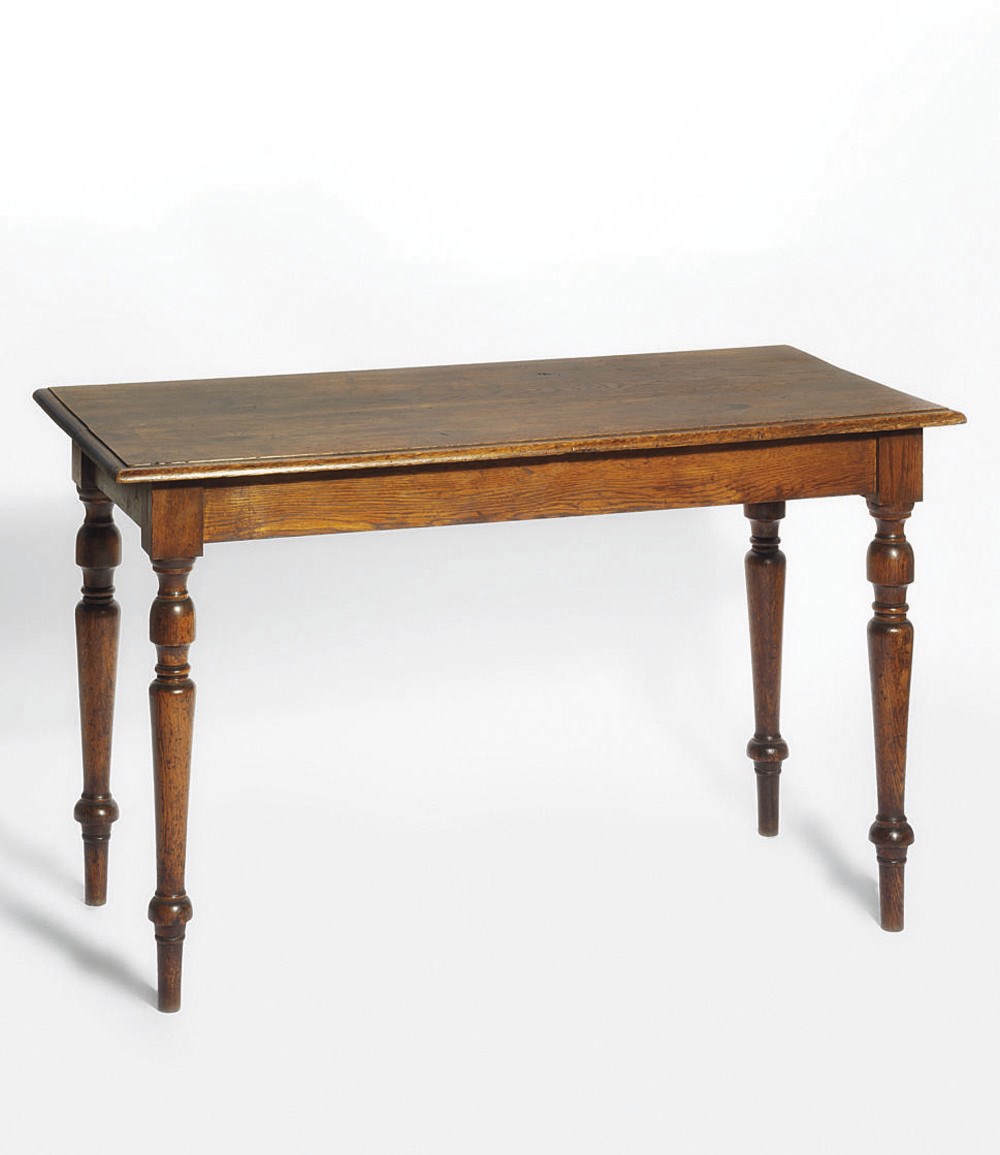 DICKENS, Charles -- Mid-Victorian oak centre table from Gad's Hill. Mid-19th century, 74.5 x 60 x 122cm, rectangular top above plain frieze on turned, tapering baluster legs. Provenance: Charles Dickens, Gad's Hill (sold Gad's Hill auction, Homan Auctioneers, Rochester, 1870, lot 252, £1.2.0 to Mr. Morris, acting together with A.E. Watchurst) -- by descent.