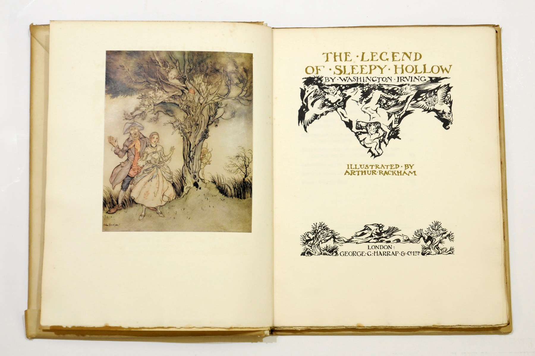 RACKHAM, Arthur (illustrator) -- Washington IRVING.  The Legend of Sleepy Hollow. London: George G. Harrap, 1928. 4°. Mounted coloured frontispiece and 7 plates by Arthur Rackham, illustrations (a few light spots). Original vellum gilt, ?original cream paper wrapper.