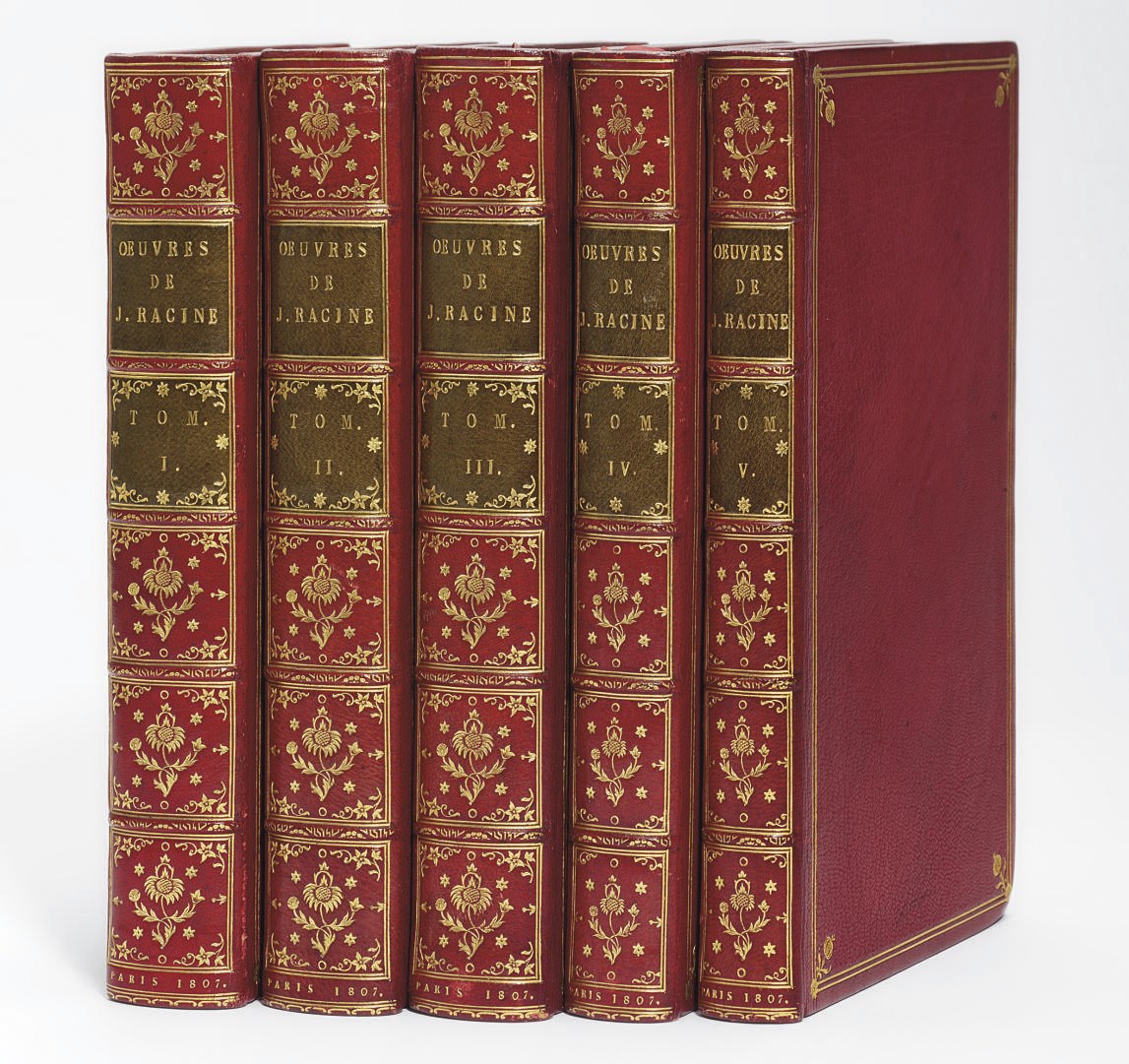 RACINE, Jean (1639-99). Oeuvres. Paris: Stereotype d'Herhan, 1807. Five volumes, 8° (216 x 140mm ). Printed on papier vélin. Title-pages with decorative devices, portrait of Racine by St. Aubin, 12 plates by Moreau, engraved by de Ghendt, Roger, Simonet, and Trire, EXTRA-ILLUSTRATED WITH 13 PLATES BY DESSENNE printed on india paper and mounted. (Pencil note on one leaf.) Crimson crushed morocco by A. Tarrant, signed on front endpaper: covers with gilt rule border and floral tools at corners, gilt spine with two green morocco labels, marbled endpapers, gilt turn-ins and top edges, partially unopened (a few small spots). Provenance: [Sir Charles A. Price (catalogue note)] -- Margaret Hart Davis (gift inscription from 'Hebu'(?),  Oct. 8th 1894) -- Charles Rugge Price (bookplate) -- Sir David Salomons (armorial bookplate).