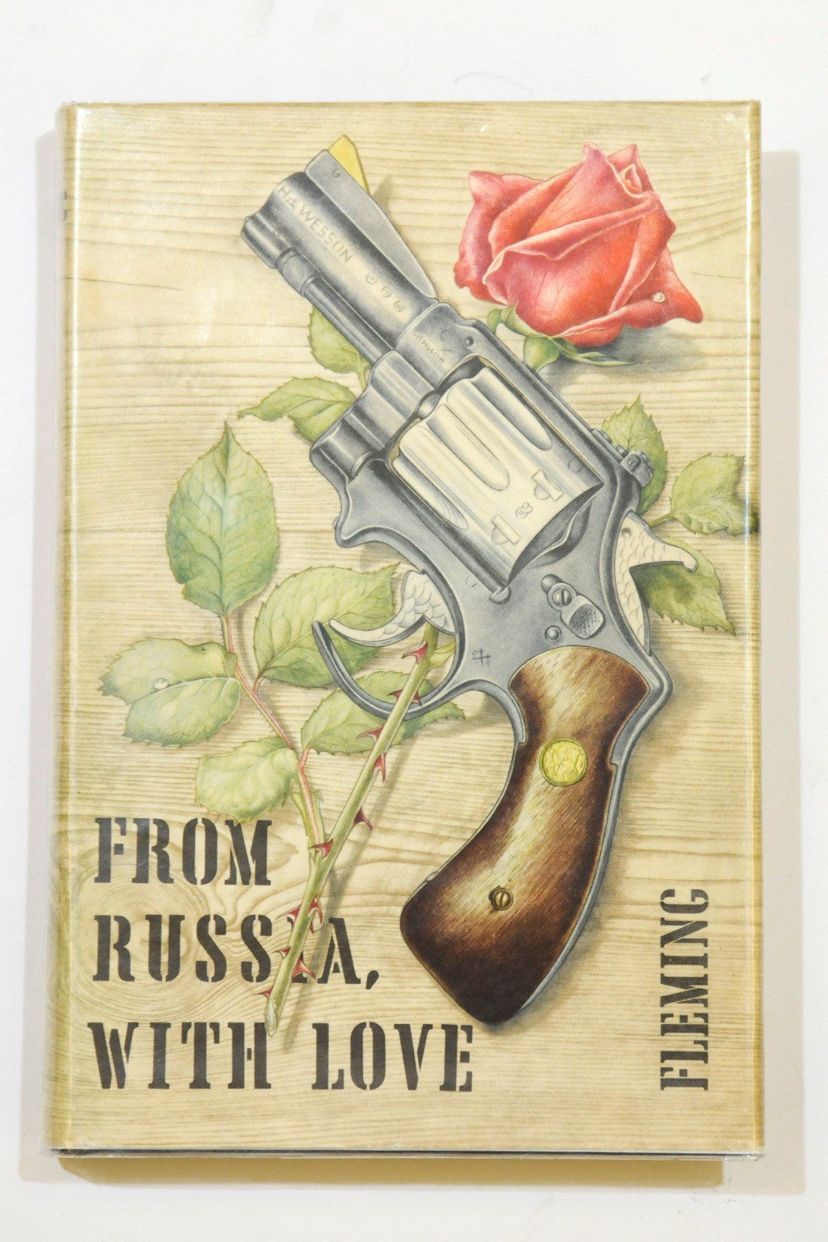 FLEMING, Ian (1908-64). From Russia, With Love. London: Jonathan Cape, 1957. 8°. (Light spotting and soiling on the edges.) Original black cloth, spine and front cover stamped in silver and metallic red, original dust-jacket designed by Richard Chopping (jacket with light wear at spine ends and corners, light browning near the spine). FIRST EDITION of one of the best titles in the Bond series.