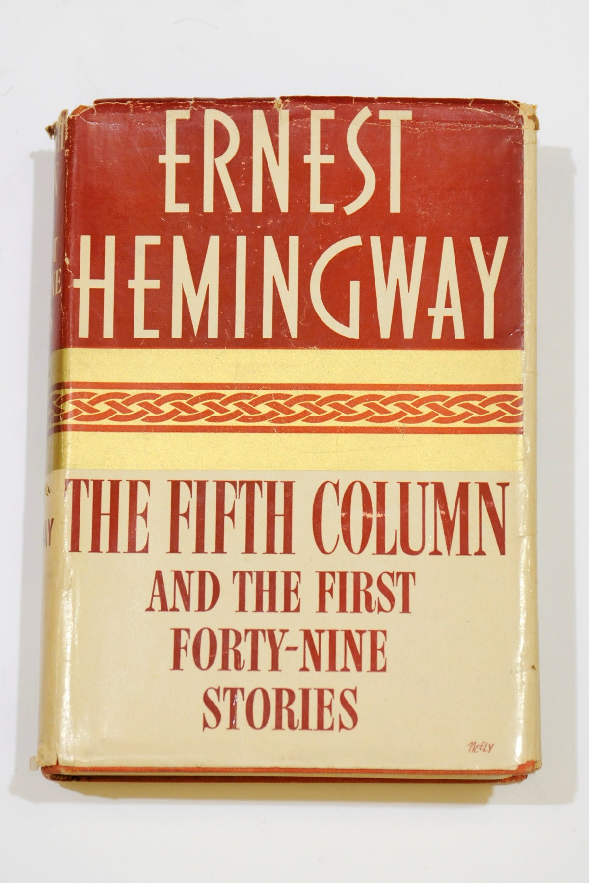 HEMINGWAY, Ernest (1899-1961). The Fifth Column and the First Forty-Nine Stories. New York: Charles Scribner's Sons, 1938. 8° (210 x 140mm). (The first few leaves lightly creased, edges lightly spotted). Original orange cloth, original dust-jacket (dust-jacket edges with small chips, short tear on the spine panel, light spotting on the endpapers). Provenance: Brentano's, Paris (small ticket on rear pastedown) -- Christine du Boisrouvray (inscription from the author).