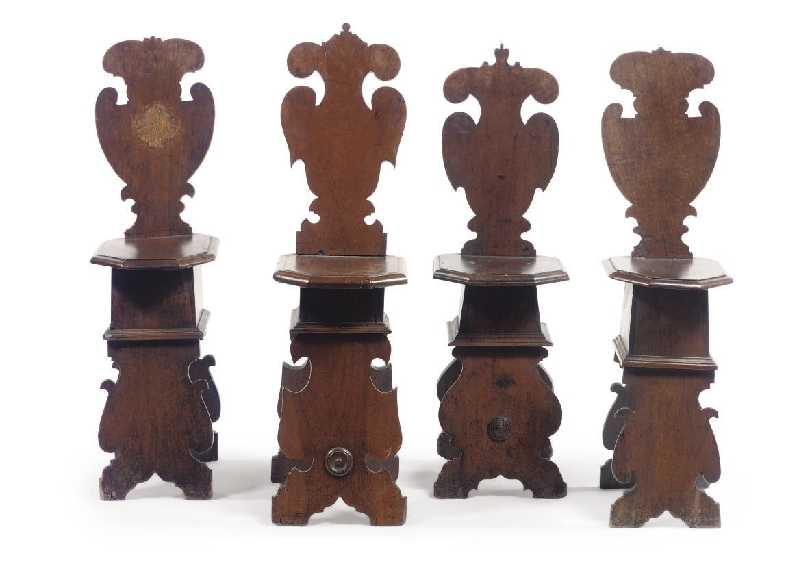 A MATCHED SET OF FOUR ITALIAN WALNUT SGABELLI