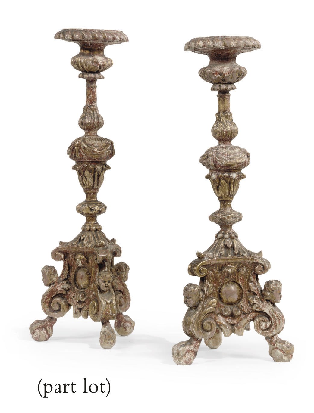 A PAIR OF ITALIAN GILTWOOD CARVED CANDLESTICKS