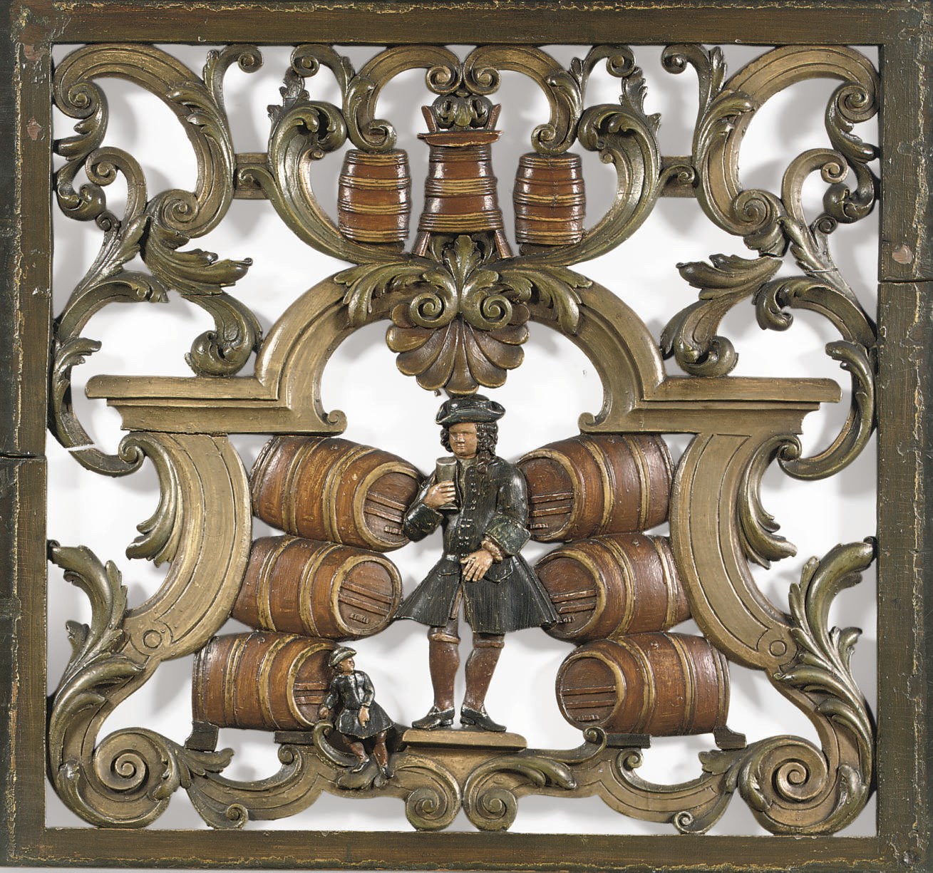 A DUTCH POLYCHROME CARVED PIERCED WOOD OVERDOOR PANEL