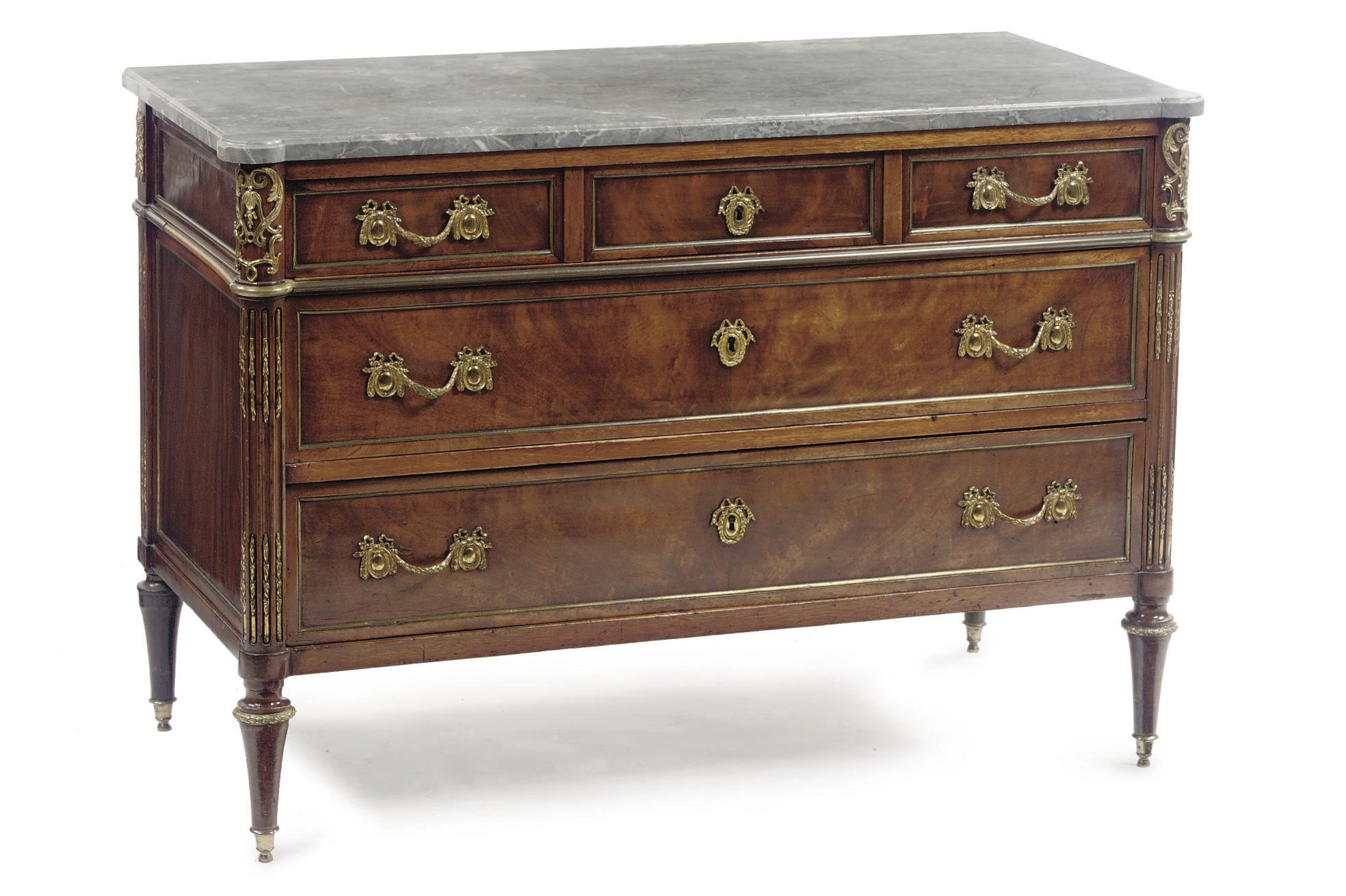 A LOUIS XVI ORMOLU-MOUNTED MAHOGANY COMMODE