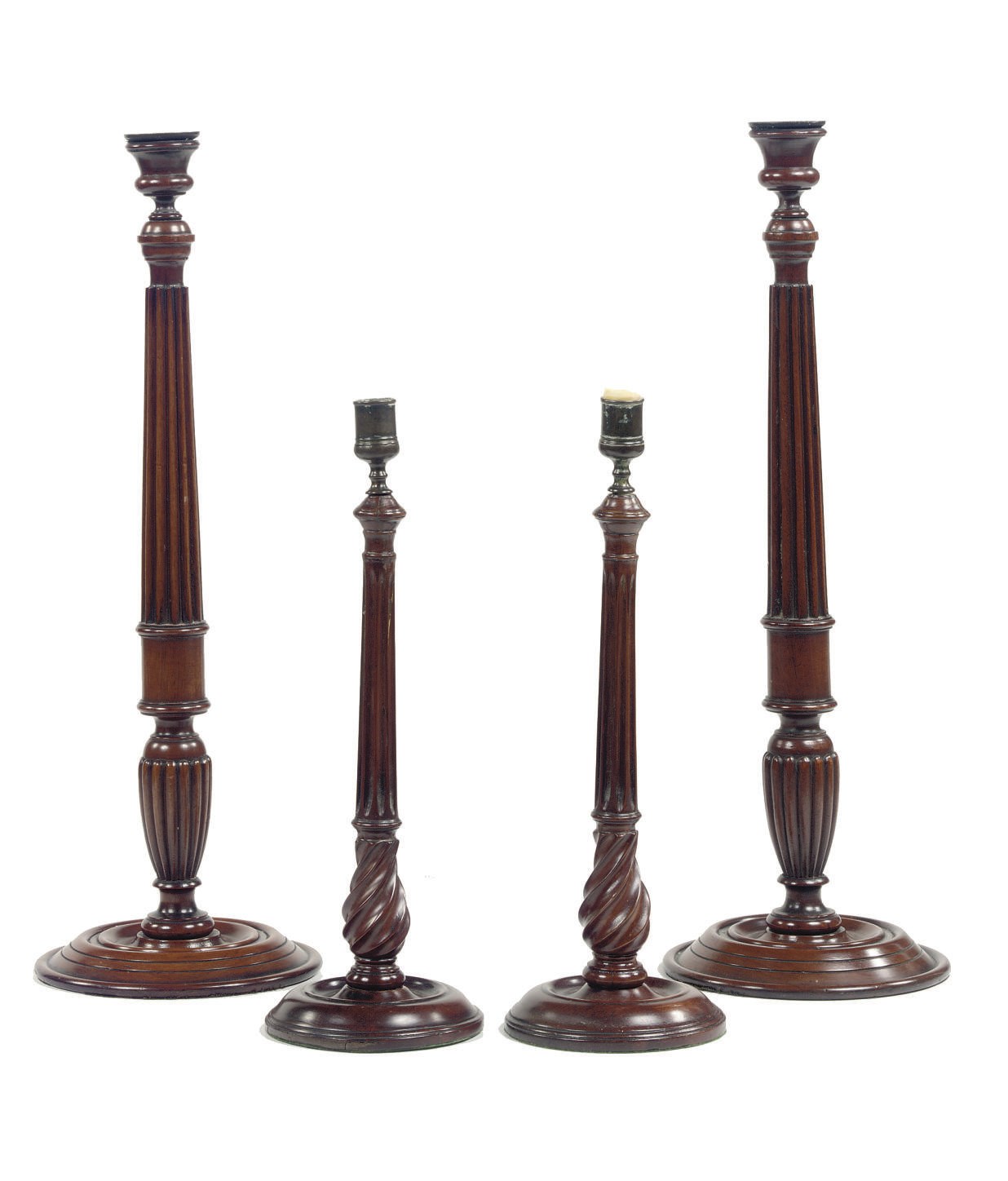 A PAIR OF GEORGE III BRASS MAHOGANY CANDLESTICKS