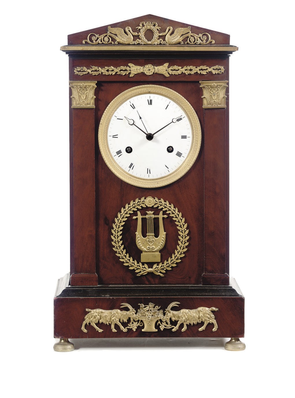 A FRENCH OR BELGIAN EMPIRE ORMOLU-MOUNTED AND EBONIZED MAHOGANY STRIKING MANTEL CLOCK