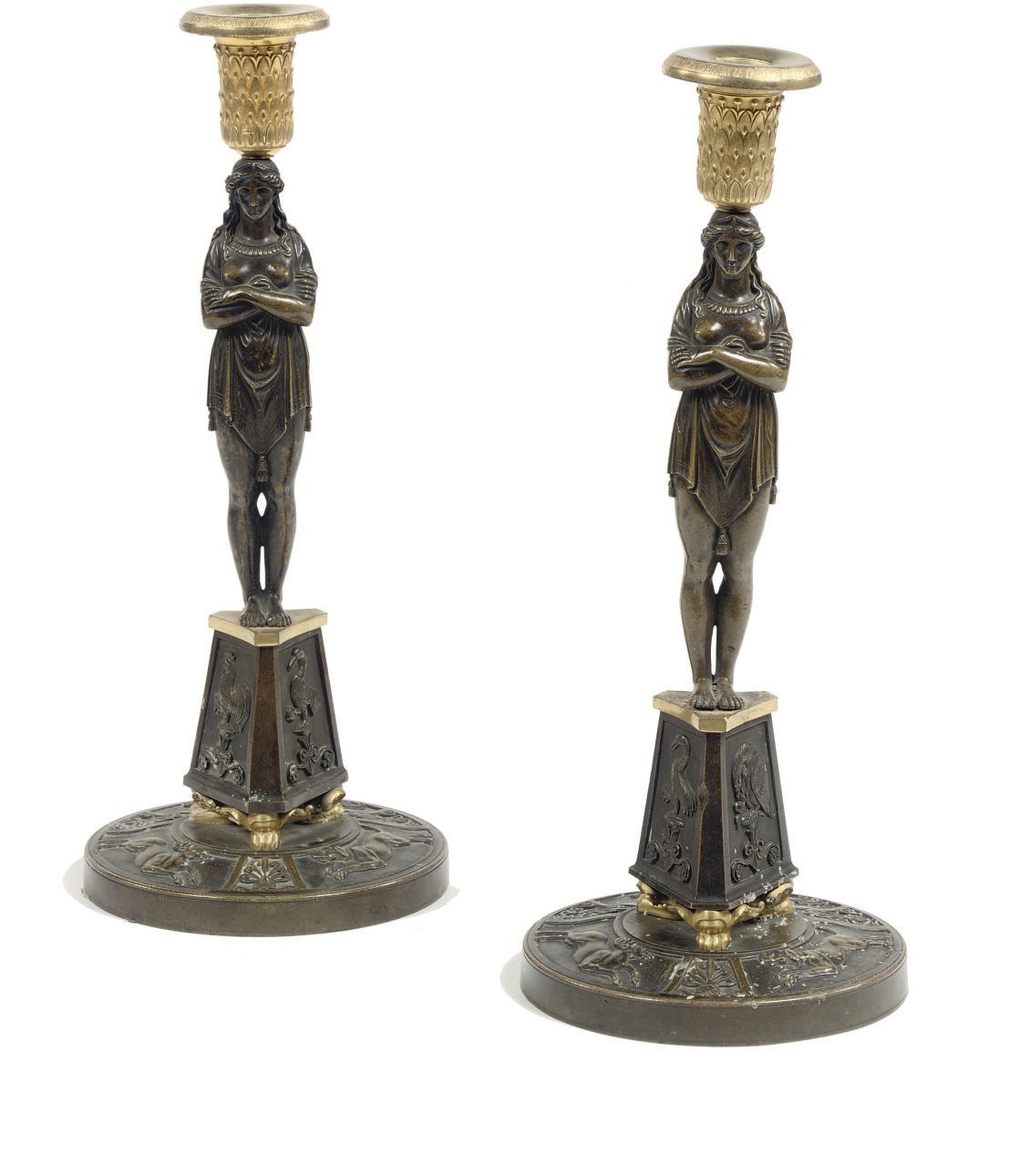 A PAIR OF EMPIRE ORMOLU AND PATINATED BRONZE FIGURAL CANDLESTICKS