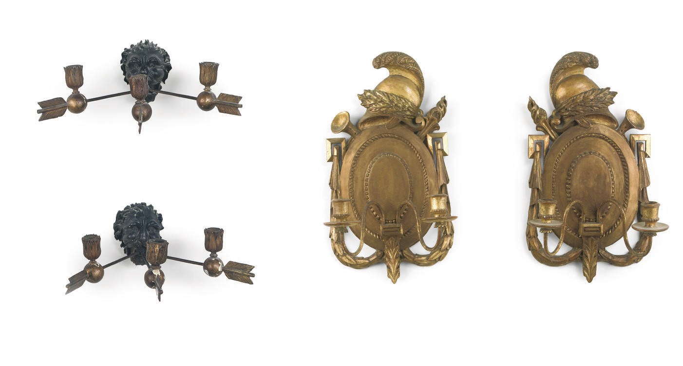 A PAIR OF DUTCH PARCEL-GILT EBONIZED CARVED WOOD THREE LIGHT WALL APPLIQUES