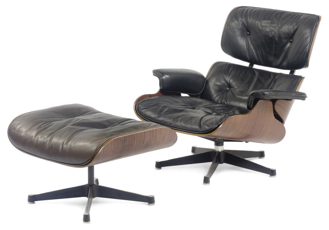 A ROSEWOOD AND LEATHER '670/671' LOUNGE CHAIR AND OTTOMAN