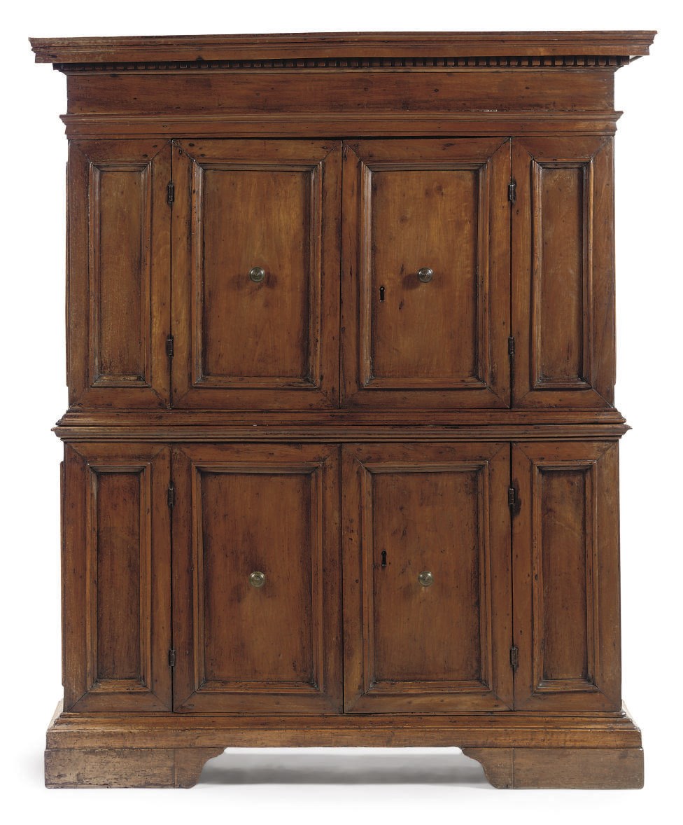 AN ITALIAN BRASS-MOUNTED WALNUT CUPBOARD