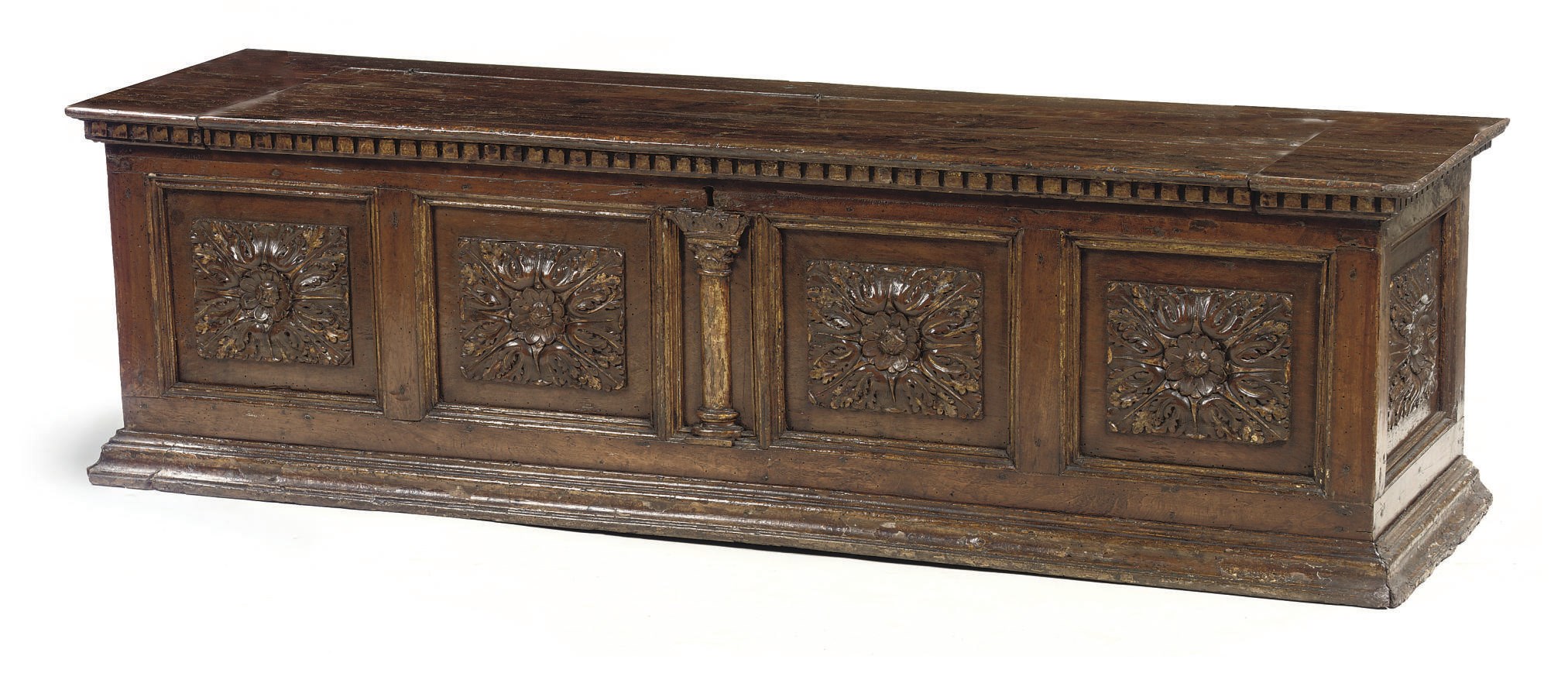 AN ITALIAN PARCEL-GILT AND WALNUT CASSONE