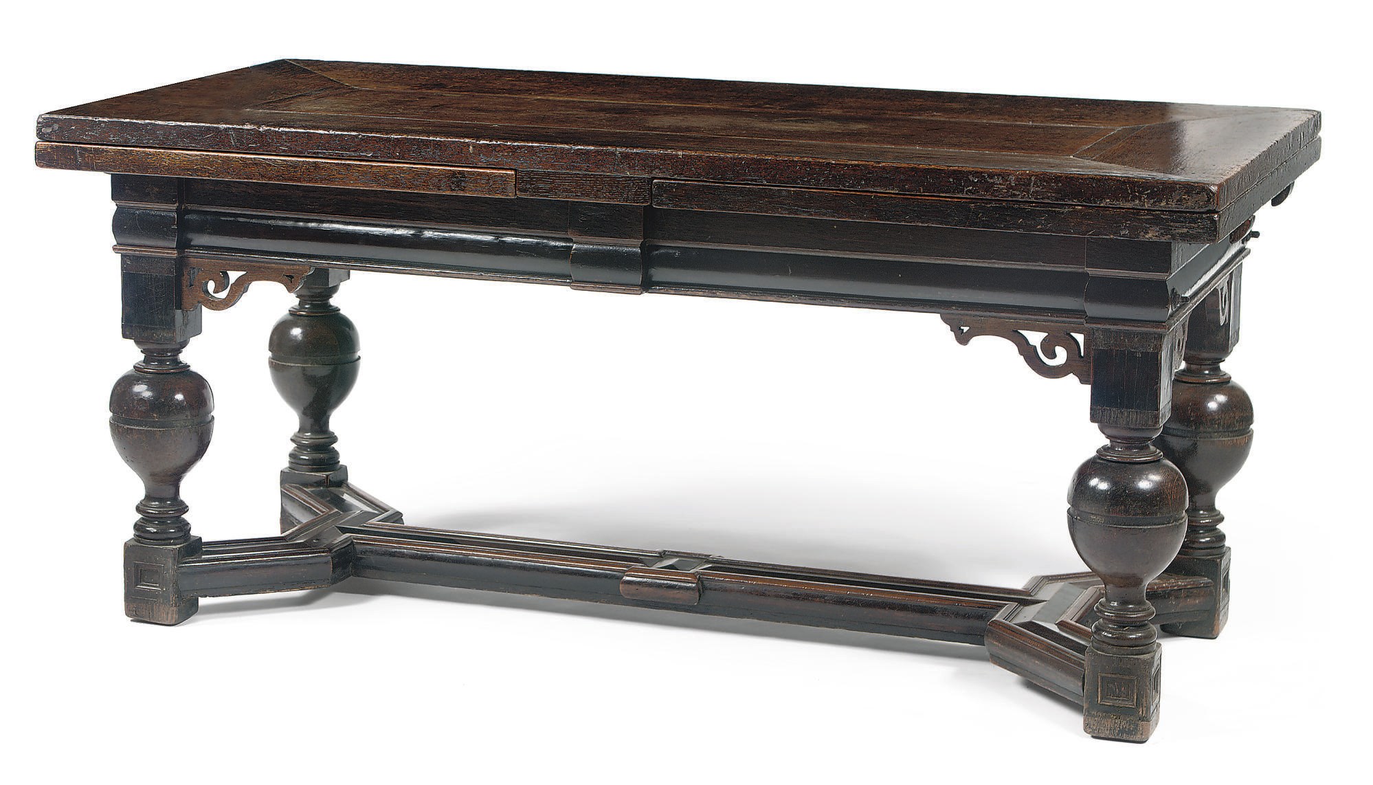 A DUTCH OAK AND EBONIZED DRAW-LEAF TABLE