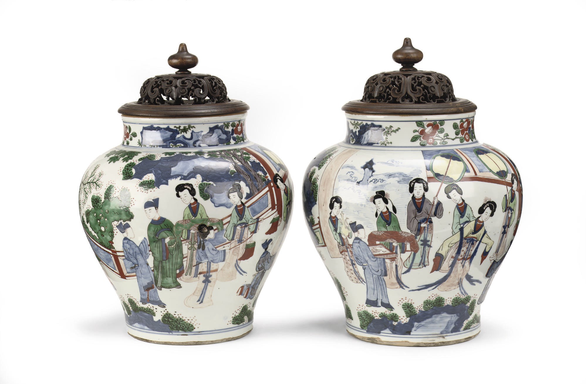 A Chinese pair of large wucai jars and wood covers