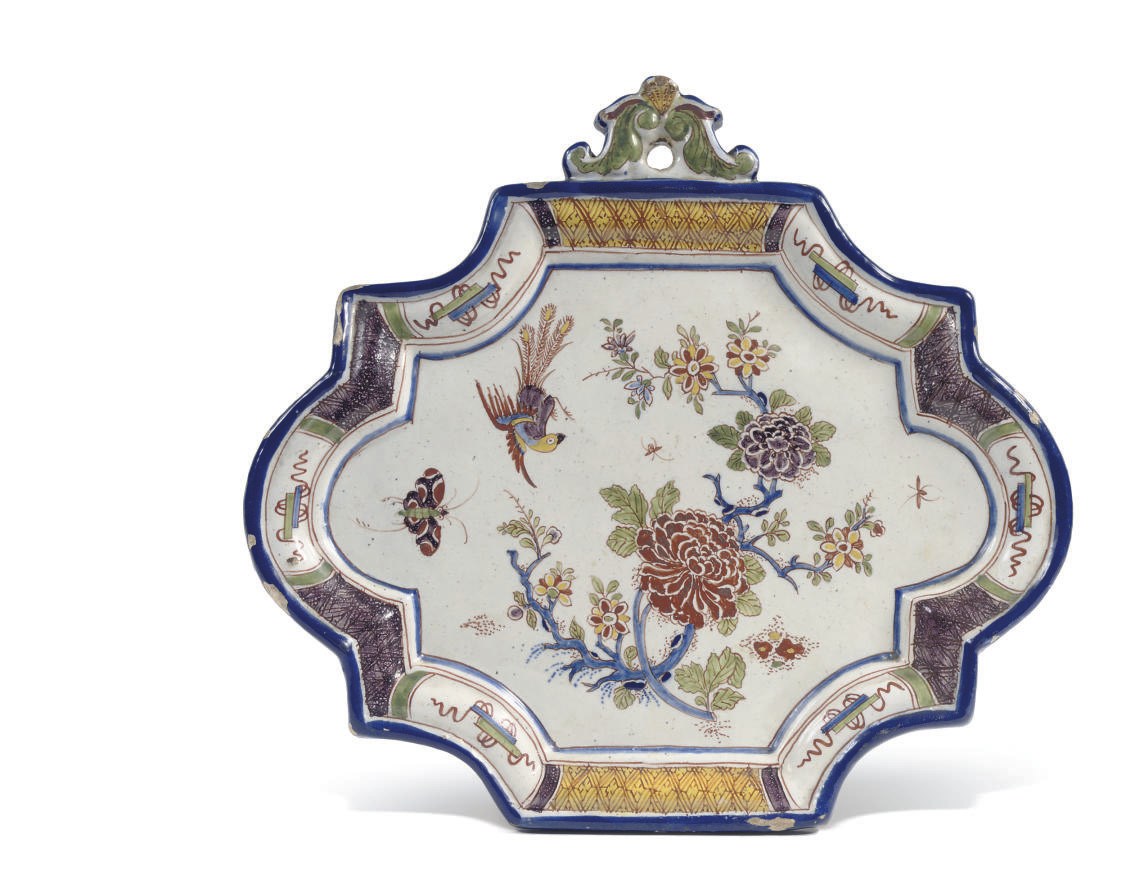 A Dutch Delft polychrome Chinoiserie plaque