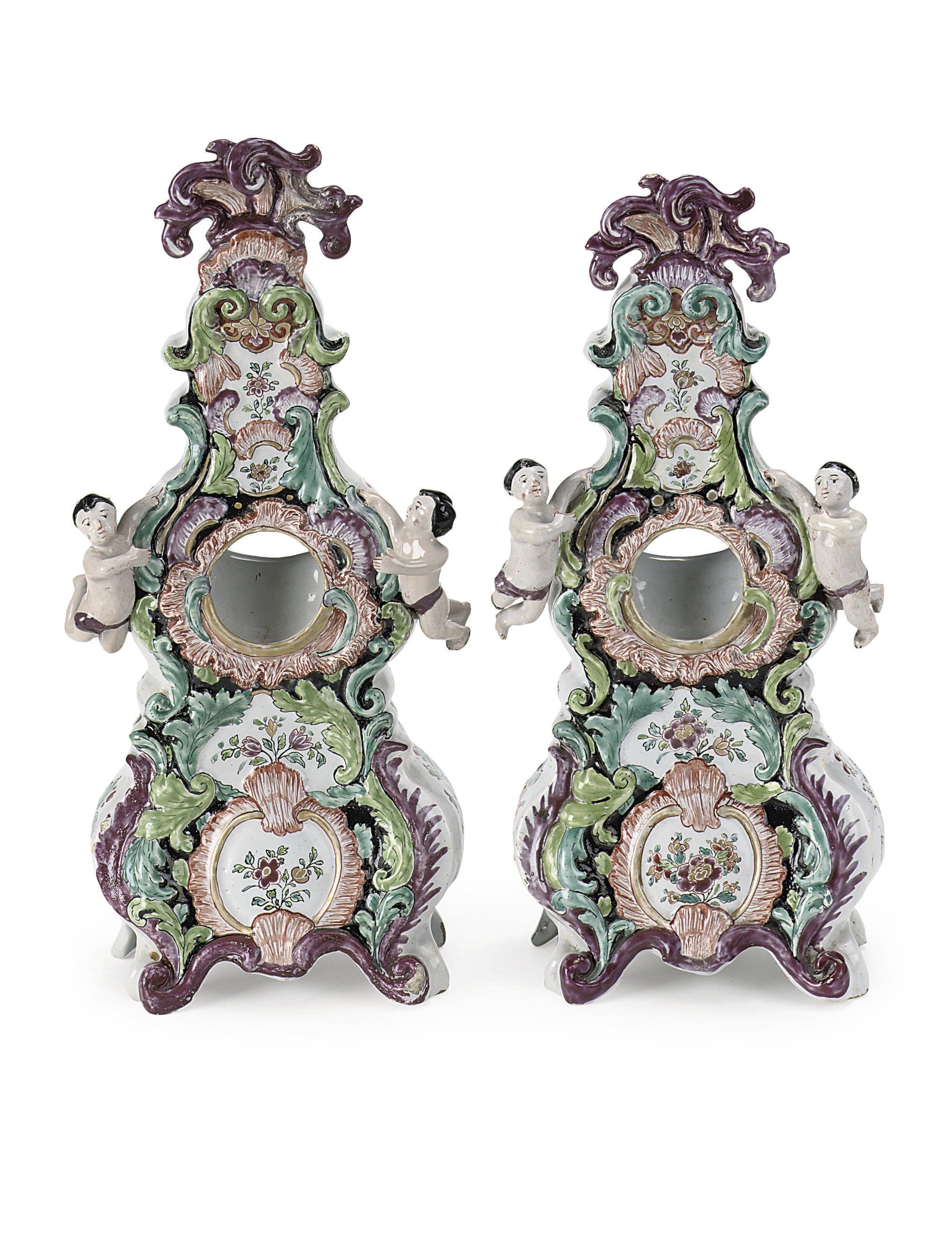 Two Dutch Delft polychrome 'Petit feu' watch stands