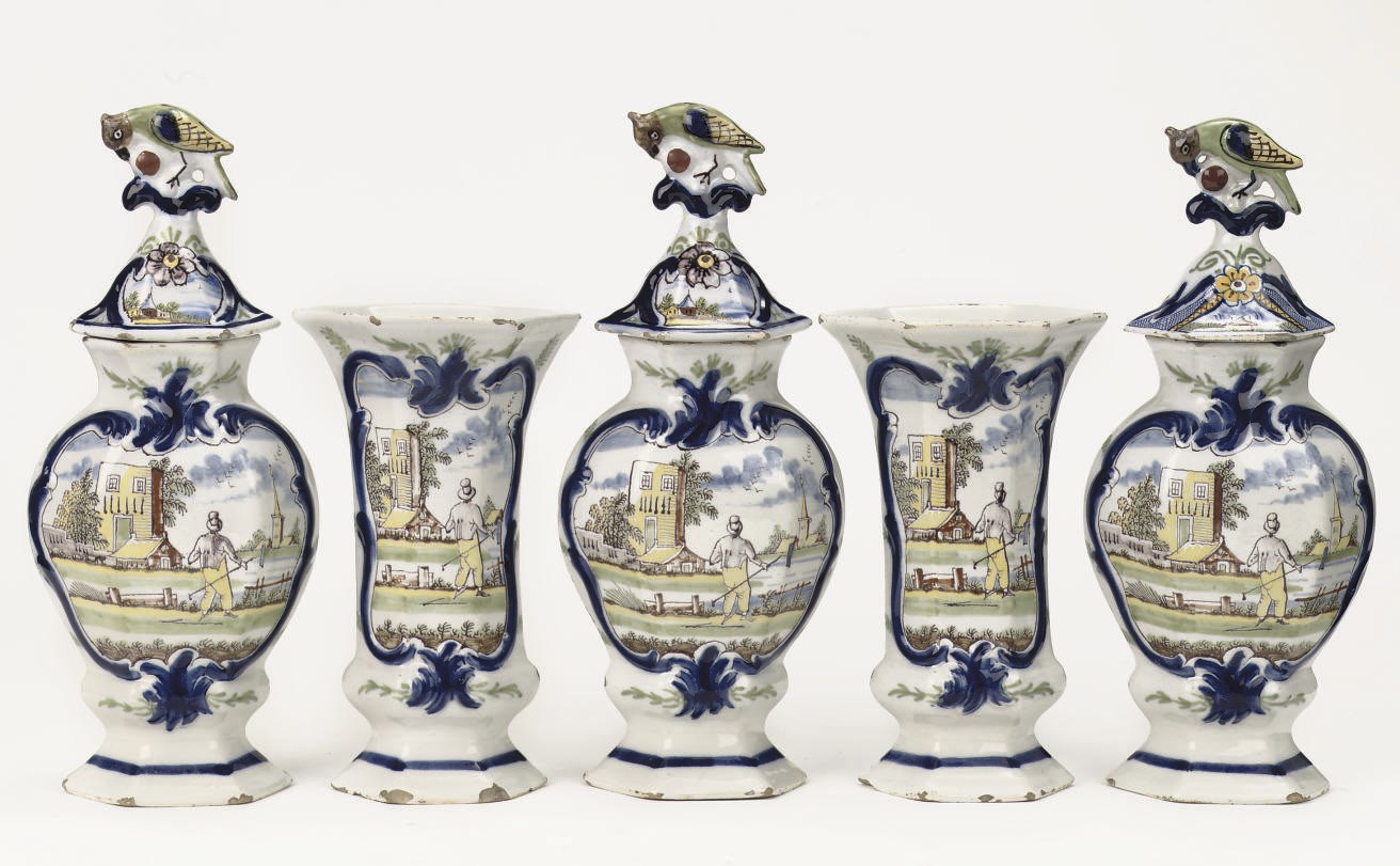 A Dutch Delft polychrome five-piece garniture