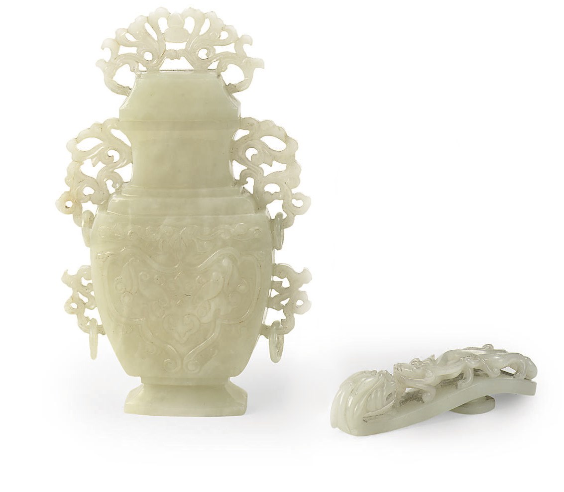 A Chinese jade carving of a vase and a garment hook