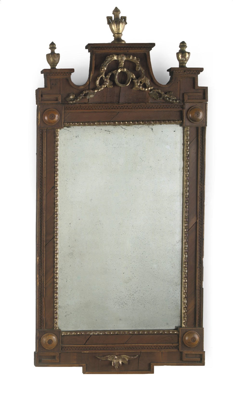 A NORTH GERMAN PARCEL-GILT FRUITWOOD MIRROR