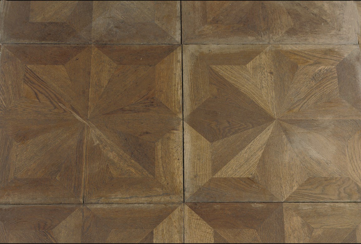 AN AUSTRIAN OAK, WALNUT AND FRUITWOOD PARQUET FLOOR