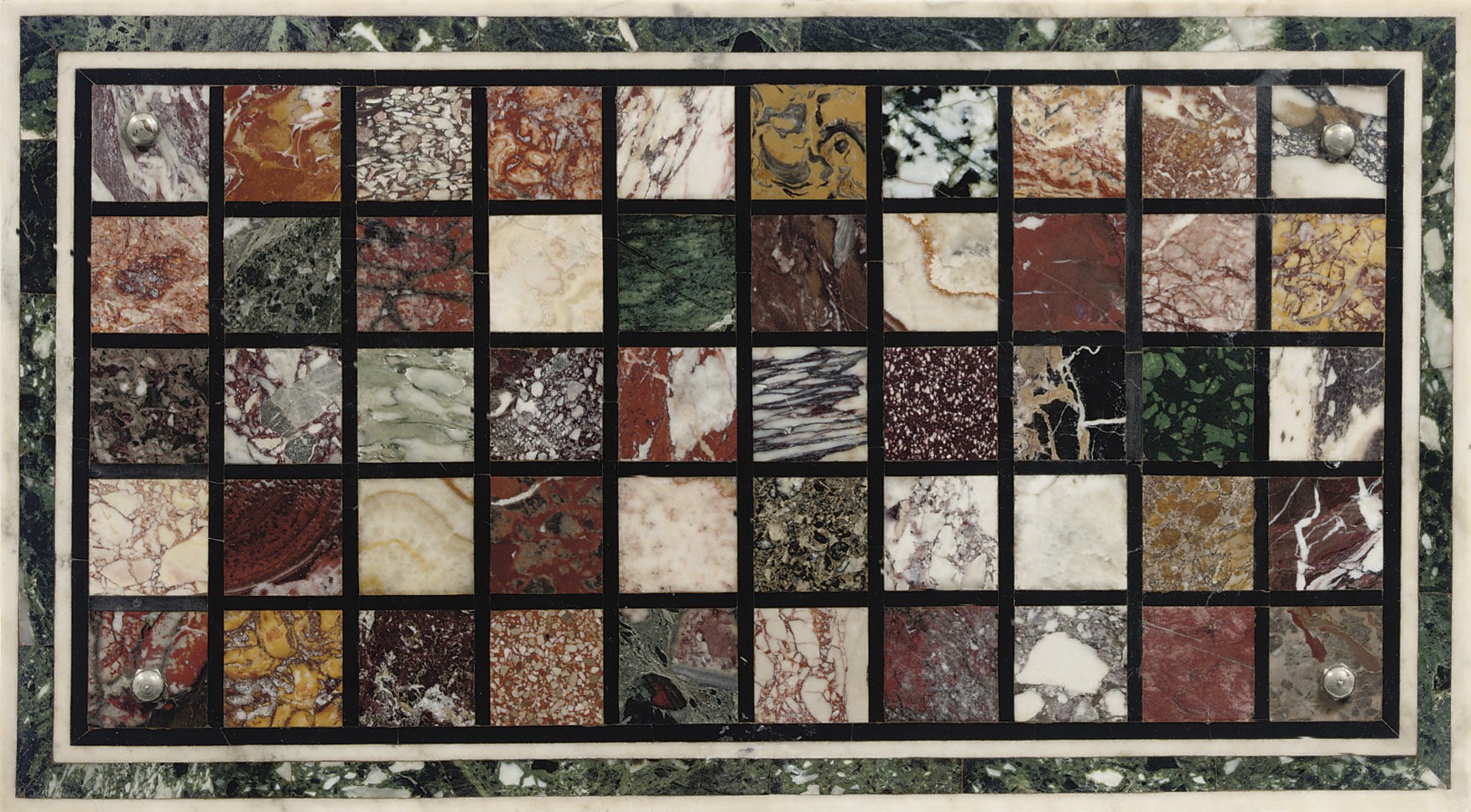 AN ITALIAN SPECIMEN MARBLE TOP