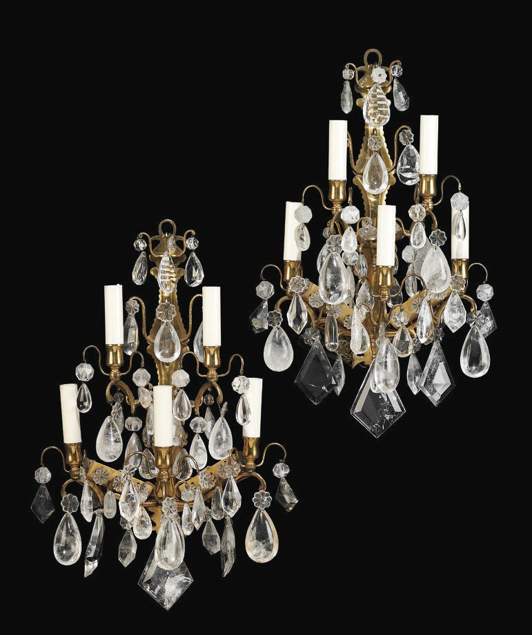 A PAIR OF ITALIAN ORMOLU, ROCK CRYSTAL AND CUT-GLASS FIVE-BRANCH WALL-LIGHTS
