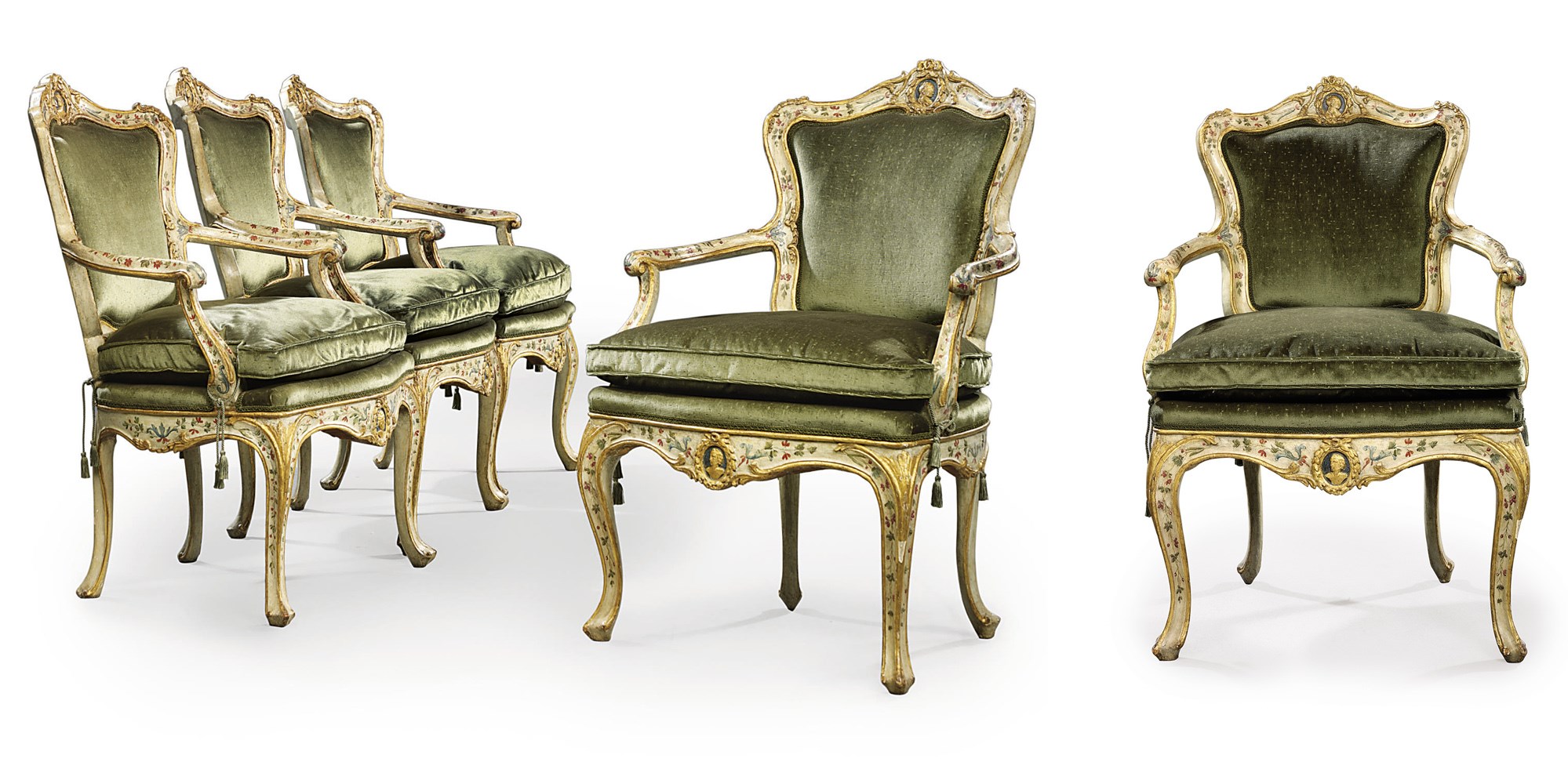A SET OF FOUR NORTH-ITALIAN PARCEL-GILT AND POLYCHROME-DECORATED ARMCHAIRS