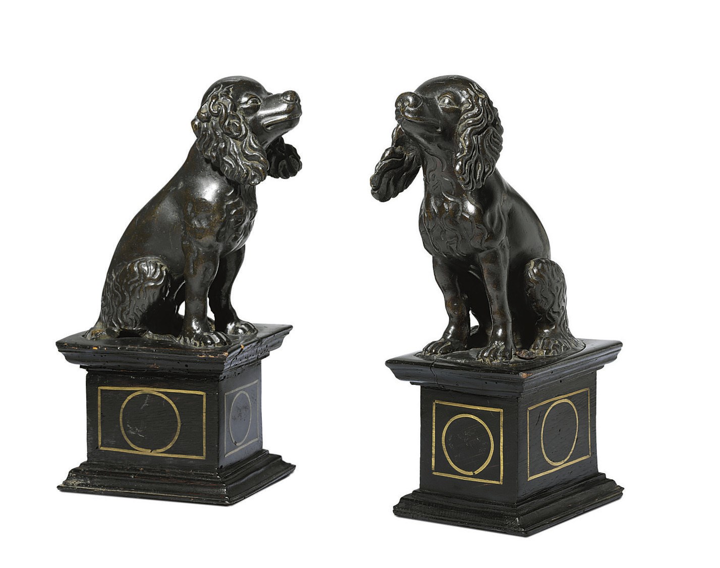A PAIR OF BRONZE MODELS OF SEATED DOGS