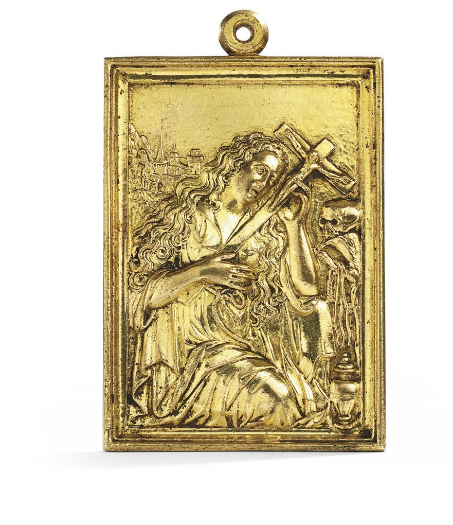 A RECTANGULAR GILT-BRONZE PLAQUETTE DEPICTING MARY MAGDALENE