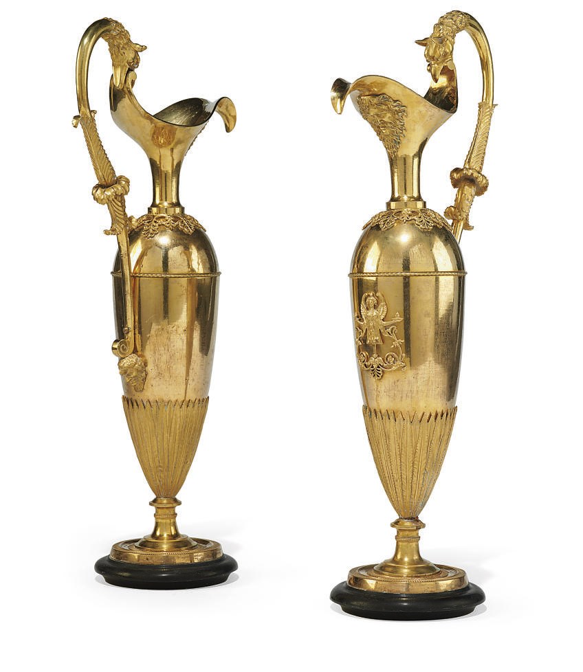 A PAIR OF EMPIRE ORMOLU EWERS