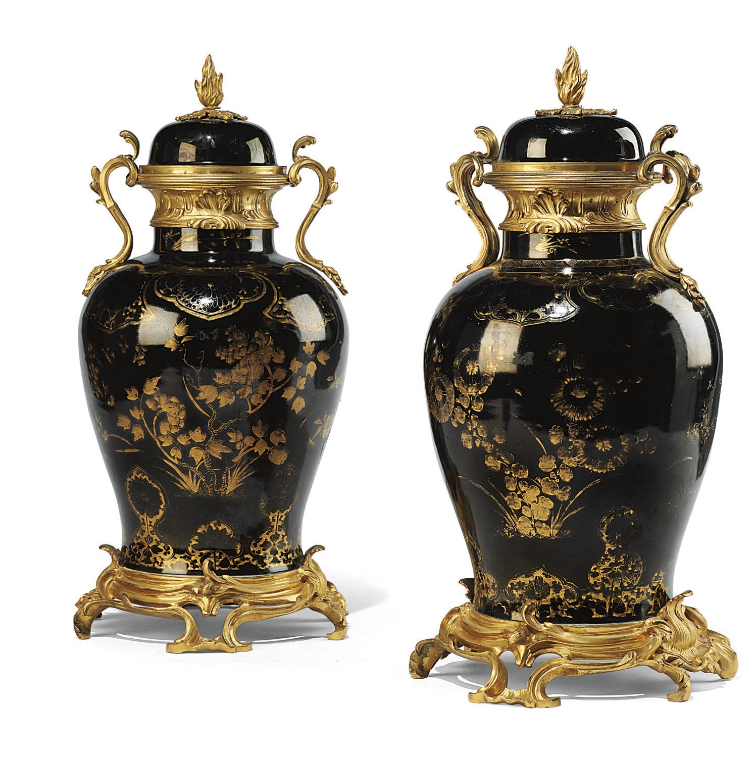 A PAIR OF FRENCH ORMOLU-MOUNTED PARCEL-GILT BLACK CHINESE PORCELAIN COVERED VASES