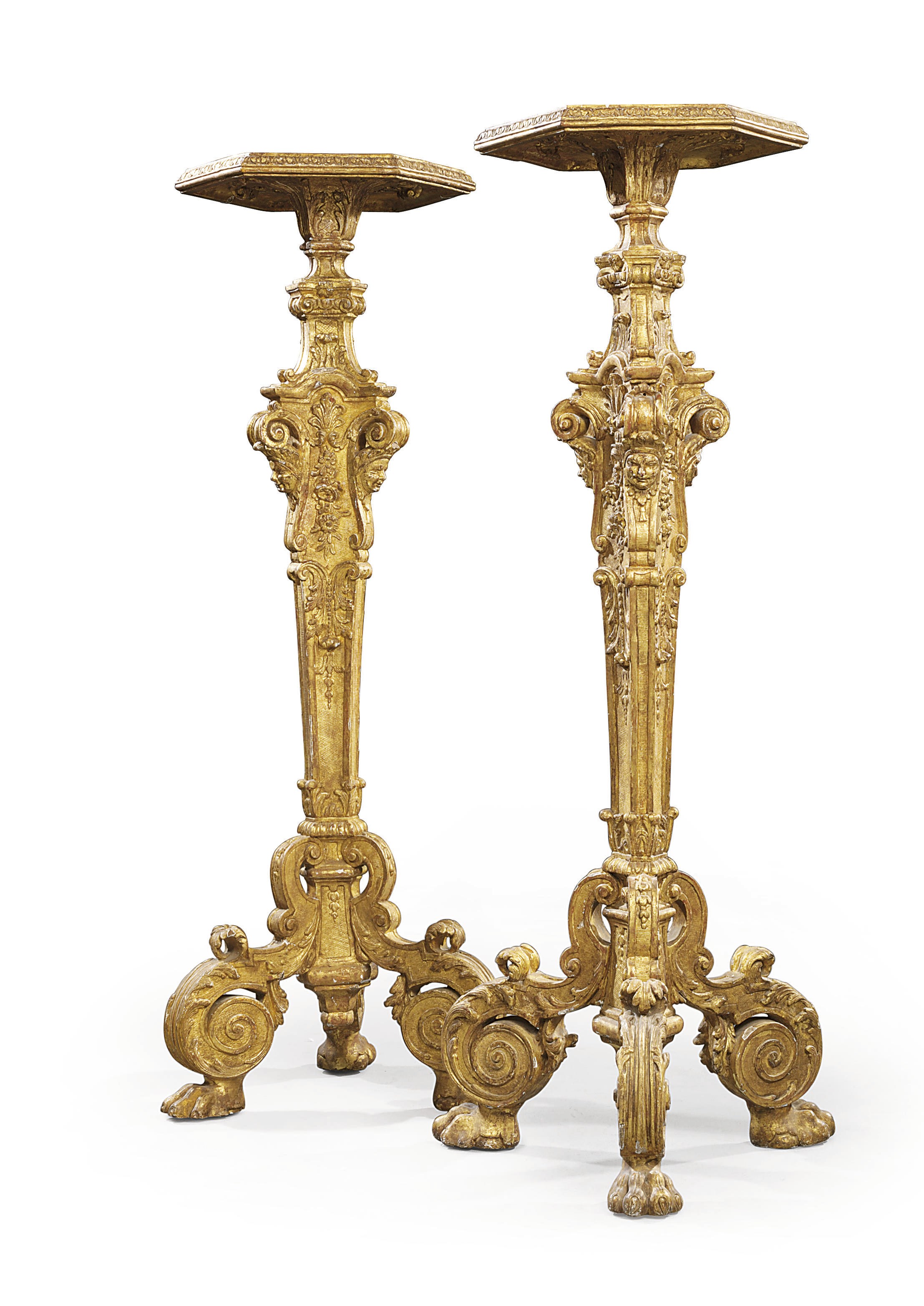 A PAIR OF REGENCE GILT OAK TORCHERES