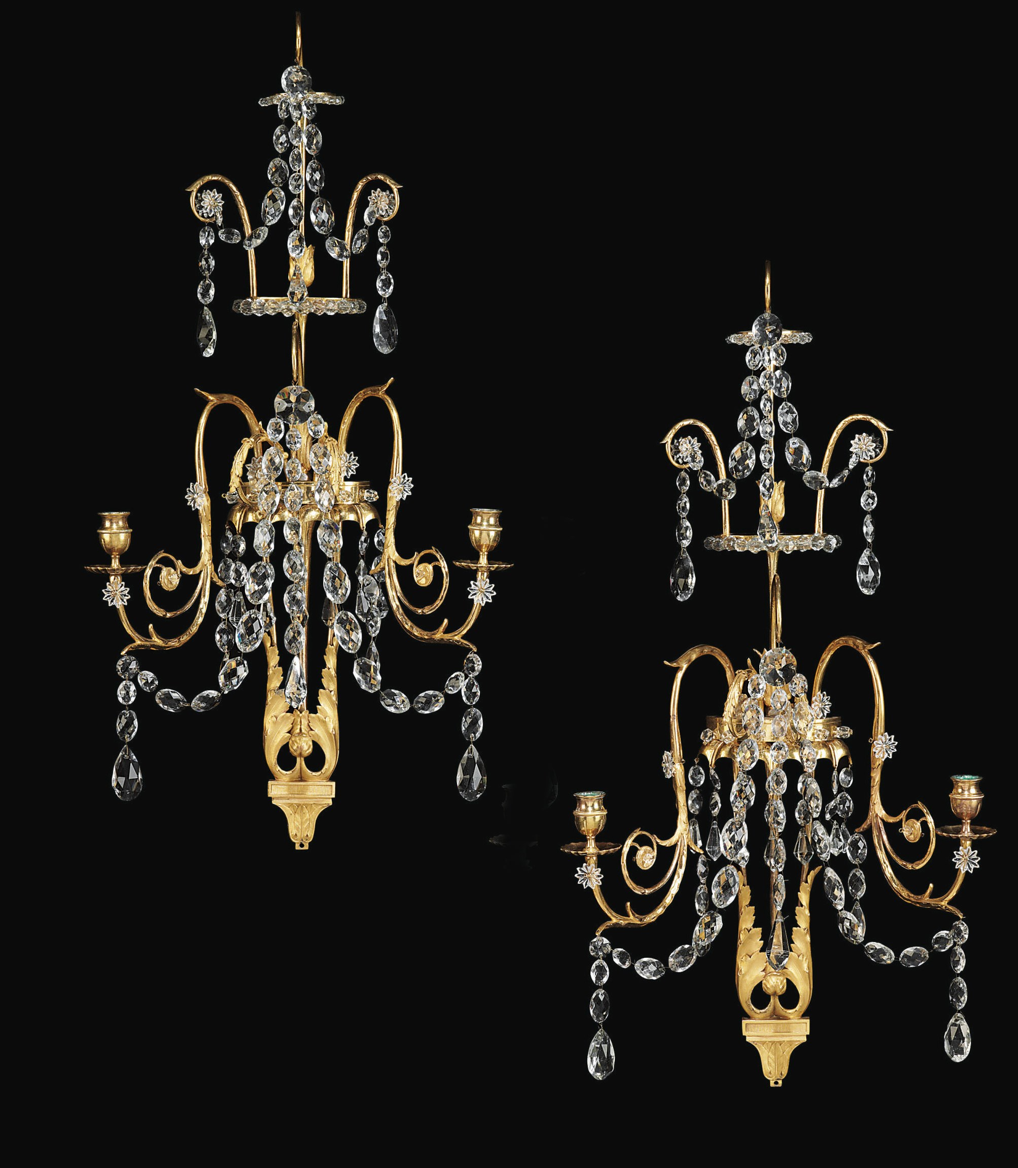 A PAIR OF SWEDISH ORMOLU, CRYSTAL AND CUT-GLASS TWO-BRANCH WALL-LIGHTS