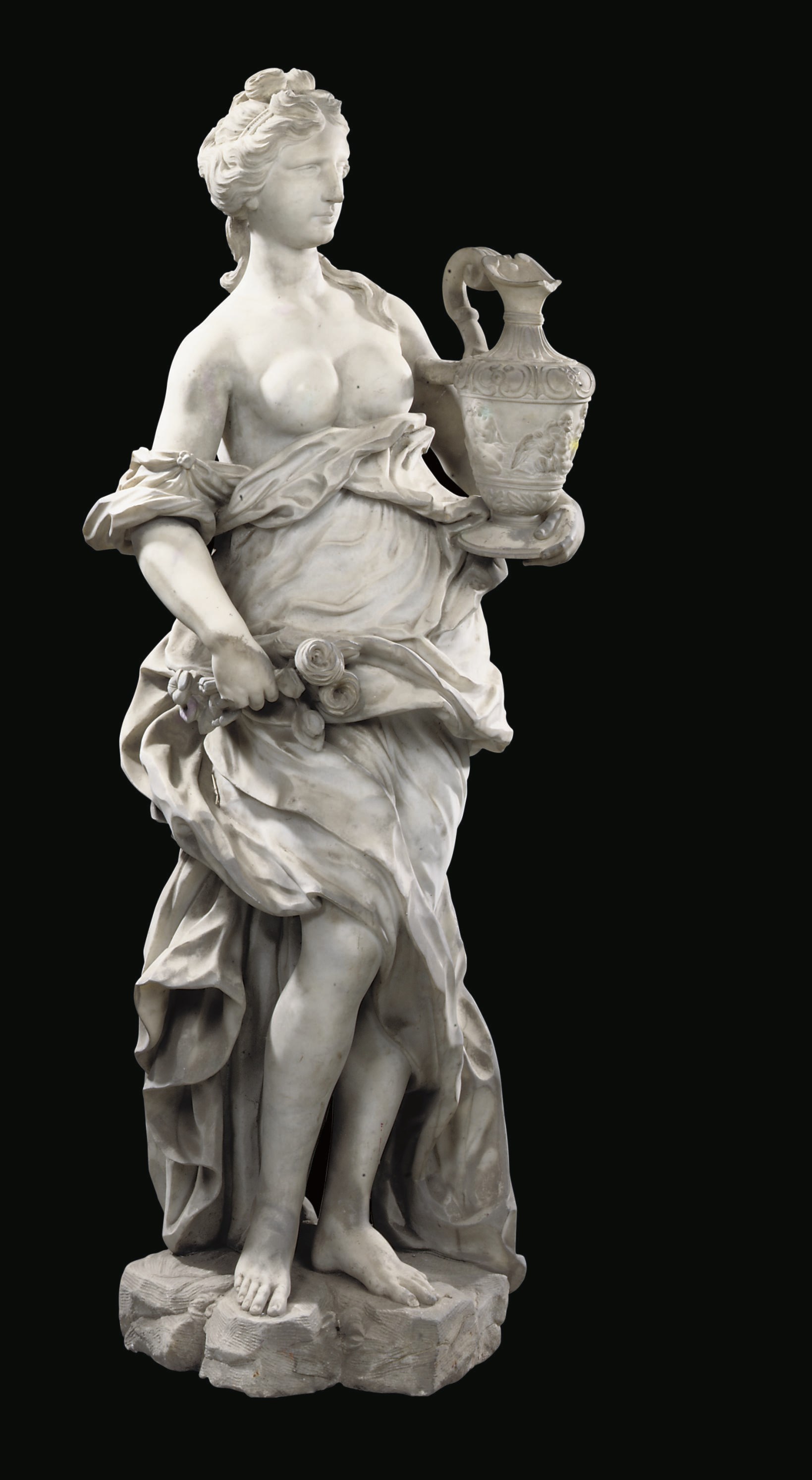 A CARVED MARBLE FIGURE OF HEBE