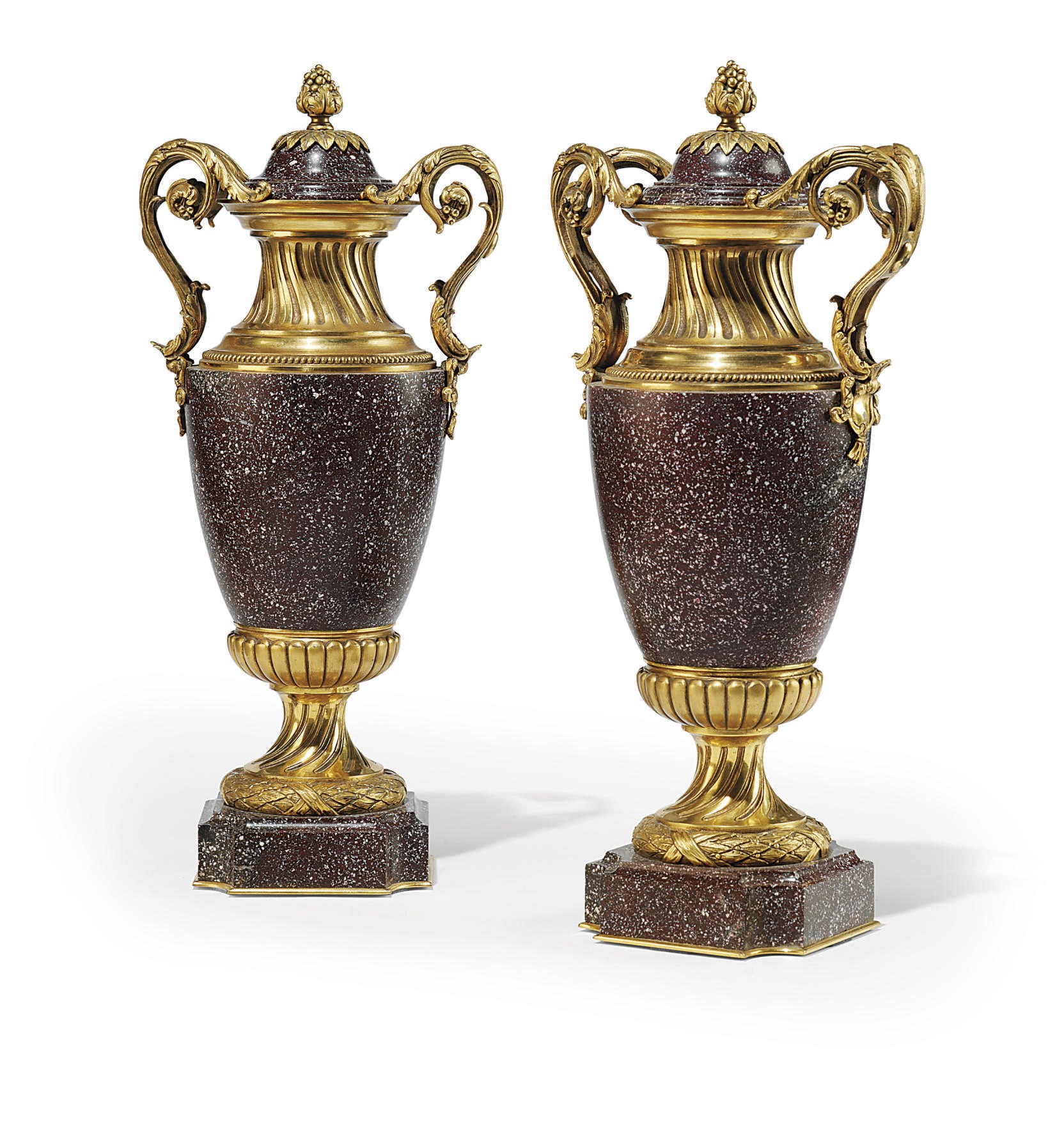 A PAIR OF ITALIAN ORMOLU-MOUNTED PORPHYRY COVERED URNS