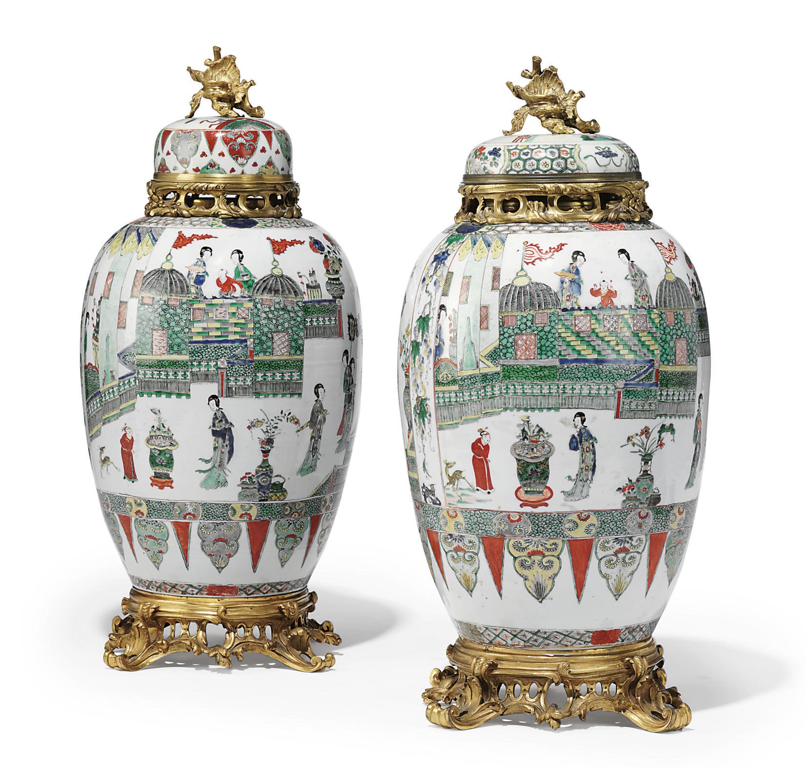 A NEAR PAIR OF LOUIS XV ORMOLU-MOUNTED CHINESE FAMILLE VERTE PORCELAIN VASES WITH COVERS