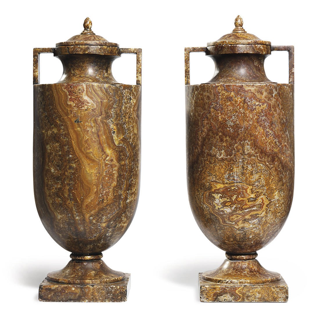 A PAIR OF CARVED ALABASTER DOUBLE-HANDLED URNS