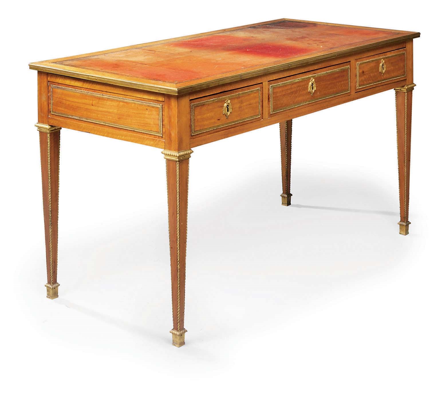 A FRENCH PROVINCIAL ORMOLU-MOUNTED BOIS SATINE BUREAU PLAT