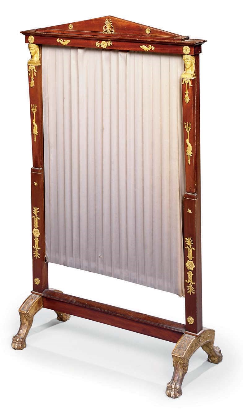 AN EMPIRE ORMOLU-MOUNTED AND PARCEL-GILT MAHOGANY FIRESCREEN