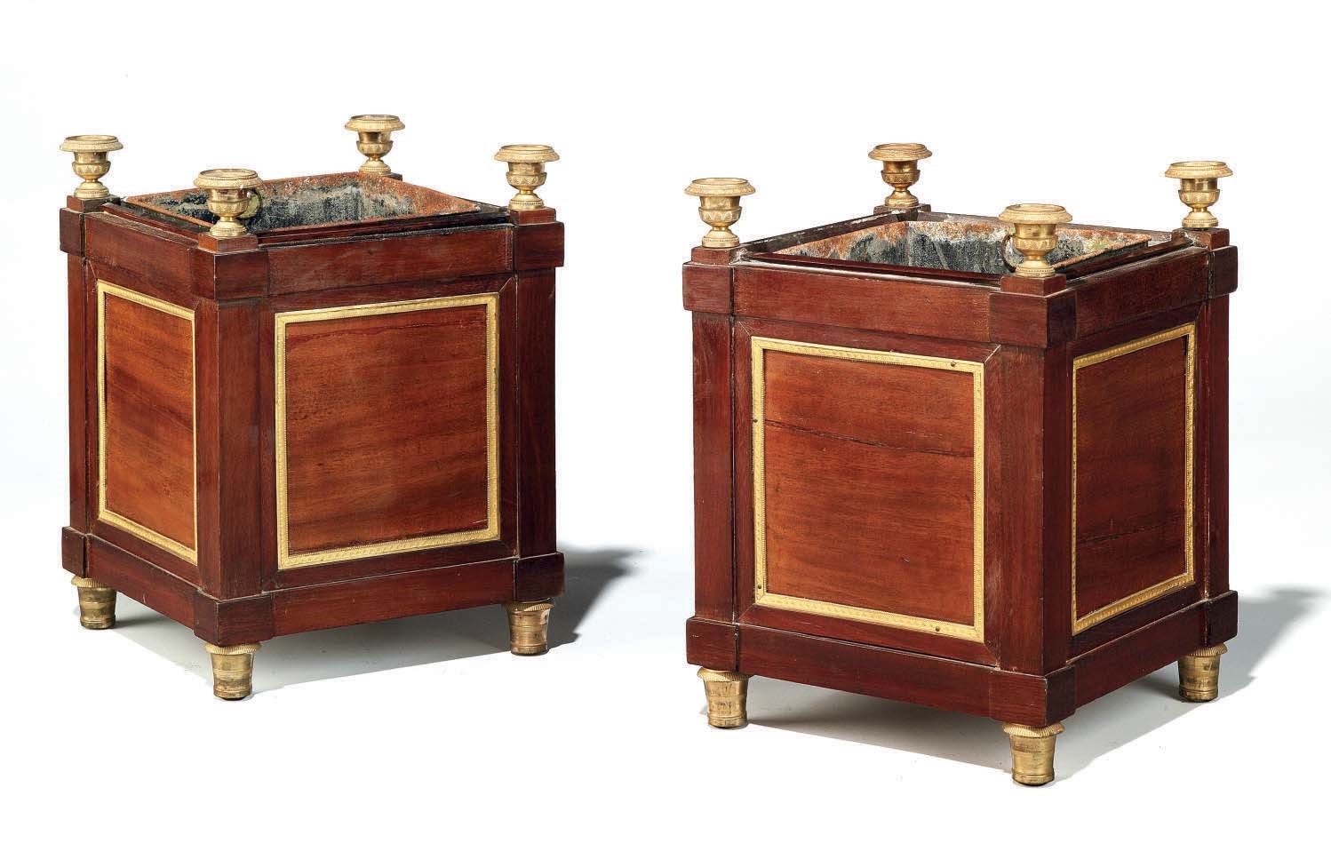 A PAIR OF EMPIRE ORMOLU-MOUNTED MAHOGANY JARDINIERES